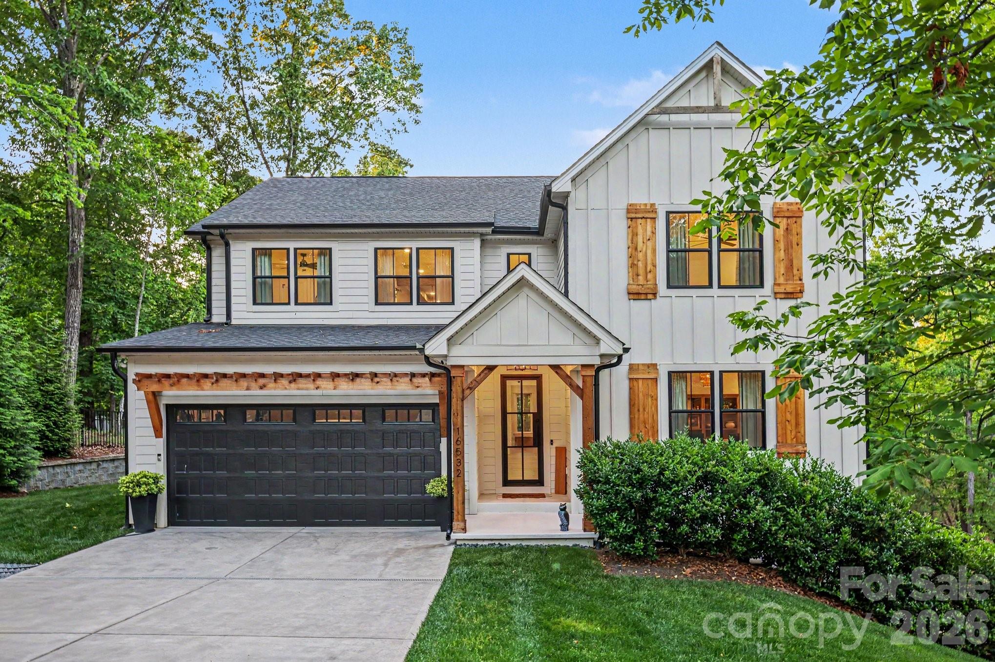 WATERFRONT-DOCKABLE LOT!   This 5 bedroom, gated waterfront retreat has 3,341 sq. ft. of living space and boasts an additional  2,146 sq. ft. unfinished walkout basement.  Perfectly positioned on an ultra-private .68-acre wooded lot with 107 feet of dockable-shoreline.  This incredible oasis is situated across from protected, treed-wood frontage ensuring that you will always have privacy and beautiful views as no one can build in front of your house! And, NO HOA! 

The gourmet kitchen is a chef’s dream offering quartz countertops and island, soft-close cabinetry, a spacious walk-in pantry, and extensive built-in organization throughout the home.

The luxurious main-level primary suite serves as a private retreat, featuring tranquil water views, California Closet custom walk-in closets, and spa bath with soaker tub and dual shower heads.

Upstairs, all secondary bedrooms include walk-in closets, while the spacious loft overlooks the 23’ vaulted ceilings, custom hardwood beams,  white oak floors, and hurricane impact windows.

Designed to maximize outdoor enjoyment, the property boasts professionally installed landscape lighting, a large fire pit area, private beach access, and a flat, ‘pool-ready’ backyard with retaining walls creating expansive and usable space. 

The seller has already installed hardwood stairs leading to the water and your private beach is ready for you when you arrive.  And after your day on the lake come soak in your 8-person hot tub!   

With city water and sewer your new home is one your friends will call a first-class resort! The upgrades are too many to list here and this one-of- a-kind property is one you must come and experience for yourself!
Video Tour:  https://listings.nextdoorphotos.com/vd/247256931