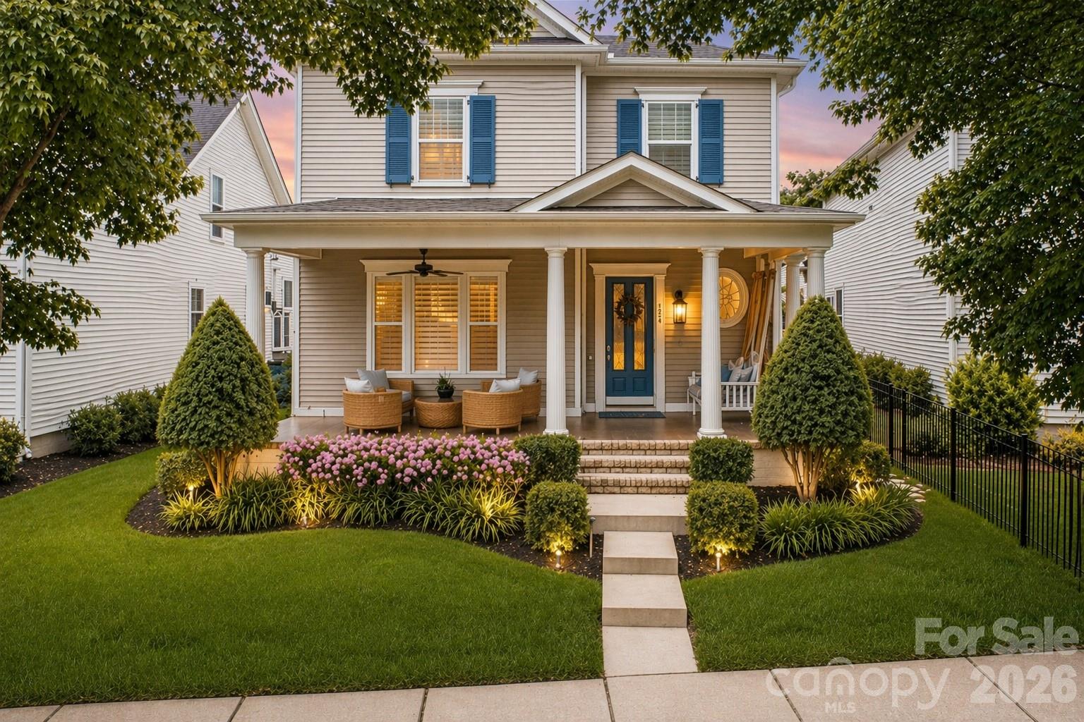 Charleston-style elegance meets magazine-worthy design at 623 Hambley House, where Southern Living comes to life. Recently renovated throughout and impeccably presented, this home stands out for its exceptional condition, timeless style, and thoughtful updates.

A deep front porch framed by azaleas is perfect for morning coffee with green area just across the street, while triple living room windows fill the home with natural light and blur the line between indoors and out.  Inside, sophisticated finishes and architectural details shine throughout, including curated fixtures, current designer colors, new oak flooring, plantation shutters, custom windows, a leaded glass front door, crown molding, and wainscoting. The open-concept floor plan is ideal for both everyday living and entertaining, with a dining area that flows seamlessly into the kitchen and main living spaces.

The kitchen features a gas range, stainless steel appliances, under-cabinet lighting, a new tile backsplash, and an eat-in island. The main-level primary suite offers convenience and comfort, complete with an expansive custom closet. The newly renovated, luxurious en-suite bath includes dual sinks, a soaking tub, separate shower, updated tile and fixtures, a linen closet, and a private water closet.

Nearby, the laundry room adds everyday functionality on the main level adjacent to the primary closet. The powder room overlooks the fenced patio with climbing roses and is filled with natural light.

Upstairs, a separate living area provides flexible space for lounging, working from home, or both. Spacious secondary bedrooms with generous closets share an oversized Jack-and-Jill bath. Additional attic space offers ample storage.

A one-year-old HVAC system with a smart Ecobee thermostat adds efficiency and peace of mind. Additional upgrades include a newer water heater, whole-house surge protector, new dishwasher, updated interior and exterior lighting, added laundry room storage, and recently insulated attic space with easy access, new sod and irrigation system, low voltage lighting, new microwave/convection oven, granite in powder room, and fully renovated primary bathroom.  Step outside to a private, low-maintenance patio with the potential to be expanded or converted to greenspace. Currently designed for al fresco dining, gas grilling, or relaxed evenings under the open sky, this outdoor area offers flexibility to suit a variety of lifestyles while the front yard offers the possibility to be fenced—similar to the charming fenced courtyards found in downtown Charleston.
Primely located in a thoughtfully designed master-planned community, this home enjoys charming streetscapes, nearby parks and amenities, and walking trails. Springfield offers an all inclusive resort-like experience centered around a scenic golf course winding through wooded terrain along Sugar Creek. Residents enjoy access to amenities reminiscent of a Hilton Head resort, including a clubhouse, pools, fitness center, tennis and pickleball courts, playground, pavilion, miles of scenic trails, and a five-acre amenity center nearly half the community preserved as natural space, plus pocket parks and regular neighborhood events, the setting feels both vibrant and relaxed.  Community newsletter available upon request.
Located in The Villas section, lawn maintenance is included through the HOA, offering a truly low-maintenance lifestyle. Anne Springs Close Greenway membership is also included, providing access to more than 2,100 acres of preserved land with trails, equestrian facilities, kayaking, a dog park, and seasonal events.  

Conveniently located near the farmers market, shopping, dining, top-rated Fort Mill schools, I-77, and Charlotte Douglas International Airport.