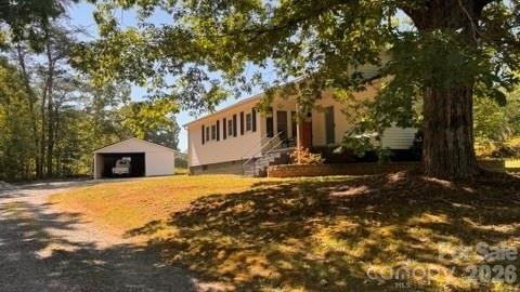 Enjoy the charm of yesterday in this 3 bedroom 1 bath home in the foothills of NC. The home was remodeled in 2010 with new vinyl siding, new windows, exterior doors, a 30 year roof, and new HVAC system. There is a lovely kitchen with plenty of cabinets and open dining area. All bedrooms are generously sized, with the primary located at the front of the house. Additional highlights are farmhouse styles with window trim and wide baseboards along with the beautiful doors  to compliment the heritage. Enjoy the outdoors from the covered front porch and rear deck for entertaining.
This home has many updates and is move in ready. BEST OF ALL NO CITY TAXES 
There is also a detached  carport with two outside storage rooms. This home is convenient to I-40 for travel to Hickory or Asheville.  This a wonderful place to call home! 
Call for your appointment today!