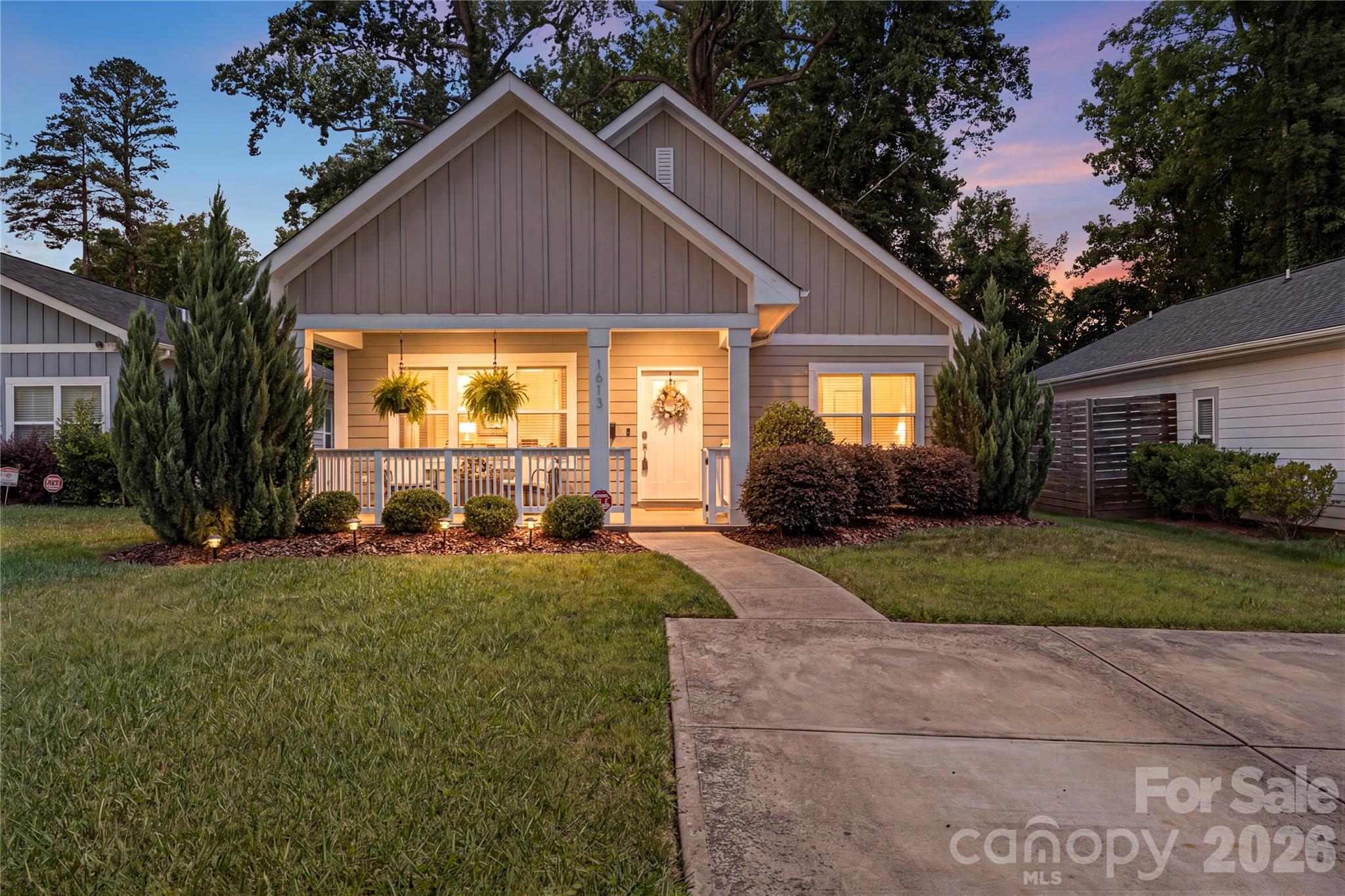 This Ranch home with NO HOA Offers 3 bedrooms and 2 bathrooms with a modern-open floor plan and a fantastic location to match; just minutes from NoDa, Camp North End and Uptown Charlotte! Inside the spacious living room flows seamlessly into the kitchen, featuring a large island, pantry, ample quartz counter tops, abundant cabinetry, and modern appliances, creating the perfect functional space for everyday living and entertaining. Durable laminate wood flooring and neutral paint extends throughout the main living areas adding warmth and style. The private primary suite includes a walk-in closet  with shelving system and ensuite bath, while two additional bedrooms offer flexibility for guests, family, or a home office. Enjoy outdoor living from the covered front porch, covered rear patio, and fenced backyard, complete with a storage shed for added convenience. With easy access to I77 and  I85 plus all that Charlotte has to offer this home has something for everyone!