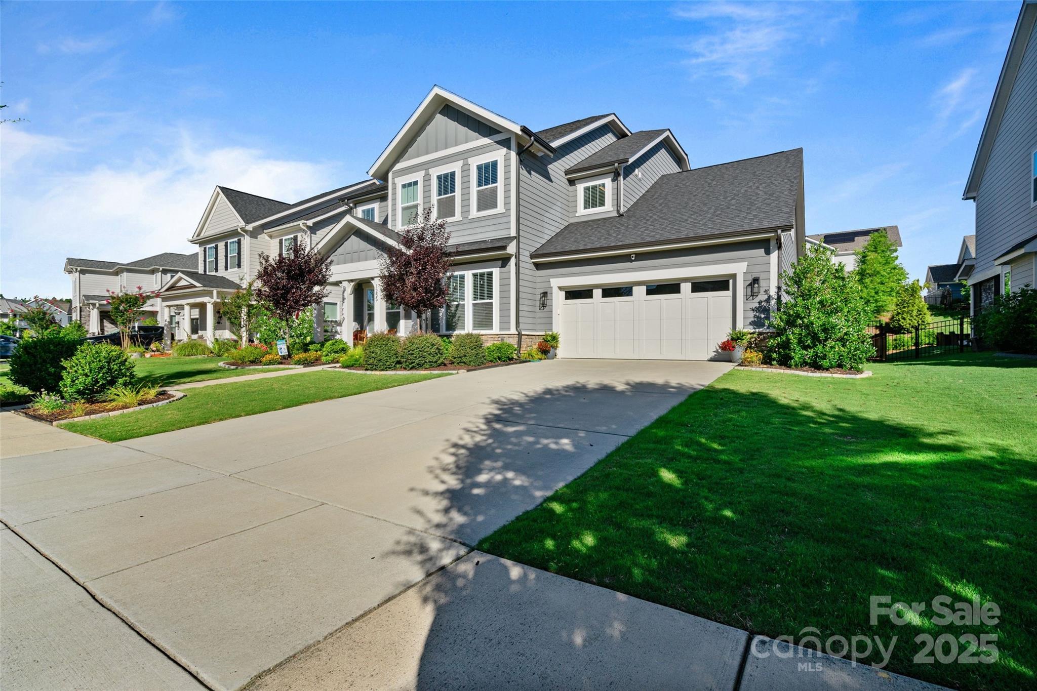 This 5 bedroom, 4.5 bath home is gorgeously designed and FULL OF STYLE! It's lucky owners will love the light filled entry, gorgeous flooring, beautiful trim work in office, half bath, and spacious dining room that takes you into the large BUTLERS PANTRY. The kitchen features SS appliances including: two ovens, microwave, gas cooktop, expansive island, breakfast area and screened porch with pull-down privacy sun shades. Enjoy the gas fireplace, OPEN FLOOR PLAN, private guest suite and full bath down. Upstairs welcomes you to a comfy loft with built-ins, 2 secondary bedrooms that SHARE full bath, 3rd secondary bedroom WITH OWN FULL BATH, and LARGE CLOSETS for everyone! Primary suite has a spacious bathroom, large walk-in closet, large shower, soaking tub, built-in cabinetry and luxurious double vanity with storage. EPOXIED GARAGE for your cars! *Field Day Park - premium turf fields, pickle0ball, playground *drainage easement at rear, per Fielding builder, & throughout neighborhood.