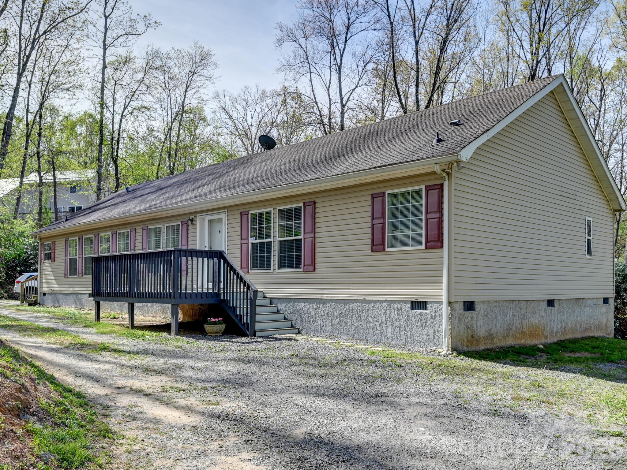 Spacious modular home on .97 acre rolling parcel. Split bedroom plan. Primary bedroom with 2 separate bathrooms, one has a 4 foot shower and the other a jetted corner tub. Walk-thru closet joins both bathrooms.
Primary bedroom also has a large deck overlooking the back yard. Great room and dining room combined with fireplace (current owners have never used). Bright kitchen with eat on bar, all appliances included, washer & dryer too! Crown molding throughout. Large bedrooms with walk-in closets.