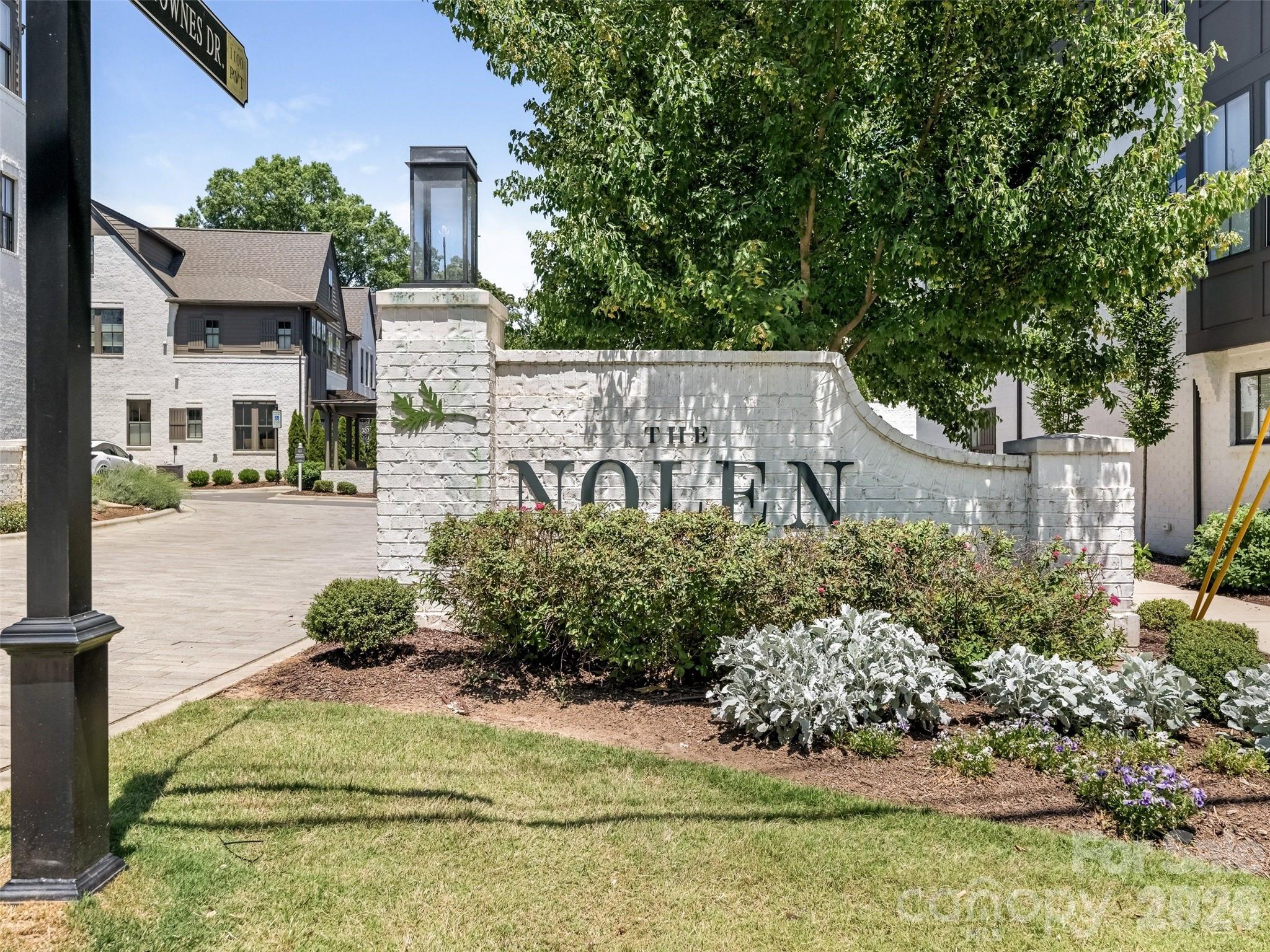 Perfectly positioned in Myers Park, this beautifully designed townhome blends English cottage inspiration with modern functionality, comfort and elegance. The home is convenient to favorite shops, restaurants, markets and parks, as well as the Greenway, Southpark, the light rail and medical facilities.  The central location makes uptown, the airport and major highways easily accessible.  

The open floor plan on the main level features abundant natural light, 10-foot ceilings, a beautiful gas fireplace, custom cabinetry, and a balcony, with living and entertaining areas flowing seamlessly together.  The kitchen is a chef’s dream with high-end appliances, a large island and walk-in pantry.  The spacious dining room accommodates an additional seating area that is perfect for family and guests or enjoying a good book. 

This exceptional floor plan provides a large private bedroom and en-suite bath on the lower level that can also be an office, playroom or bonus room. Each level features beautiful crown molding. A tucked away sidewalk leads from the front of this private end unit to the back entrance of the garage.  Guest parking is plentiful. This is the perfect opportunity to enjoy the charm and convenience of living in Myers Park in a townhome community known for its fun social gatherings, book club, holiday progressive dinners, and spirit of warmth and welcome. Plus, this home is ideal for those seeking a low-maintenance lifestyle without the demands of yard work.  A future elevator can be added if needed.