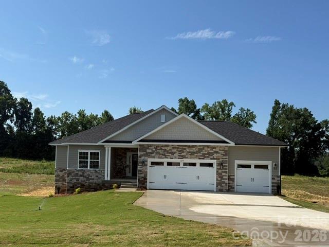 Only $1,000 down to write a contract—don’t miss this exceptional opportunity to own brand-new construction in the desirable McNeely Farms community in Mt. Ulla, NC! Situated on a spacious 1.01-acre homesite, this new construction home offers peaceful country living just minutes from downtown Mooresville, shopping, dining, and convenient access to I-77 and I-85.This thoughtfully designed 3222 sf basement with 3 car garage home features 4 bedrooms, 3 full baths, a dedicated flex space/office, and a fully finished basement—perfect for today’s versatile lifestyle. The main level includes 3 bedrooms and 2 baths, along with a spacious open-concept kitchen showcasing quartz countertops, a large center island, tiled backsplash, and a gourmet stainless steel appliance package.The finished basement expands your living space with an additional bedroom, a flex room or office, and an impressive 27’ x 20’ recreation room—ideal for entertaining, a home gym, or media space. Enjoy seamless indoor-outdoor living with walk-out access to a patio and a private, level backyard.Laminate wood flooring flows throughout the main living areas. The primary suite offers a relaxing retreat, complete with a beautifully tiled 5-foot shower.Step outside to a 16’ x 14’ covered deck overlooking the serene surroundings—perfect for enjoying quiet mornings or evening gatherings. Exterior features include durable Hardie board siding and an upgraded stone package, all with the added benefit of no HOA fees. Closing cost paid (except prepaids and points) with use of preferred lender.  Flex cash available to lower interest rate!!