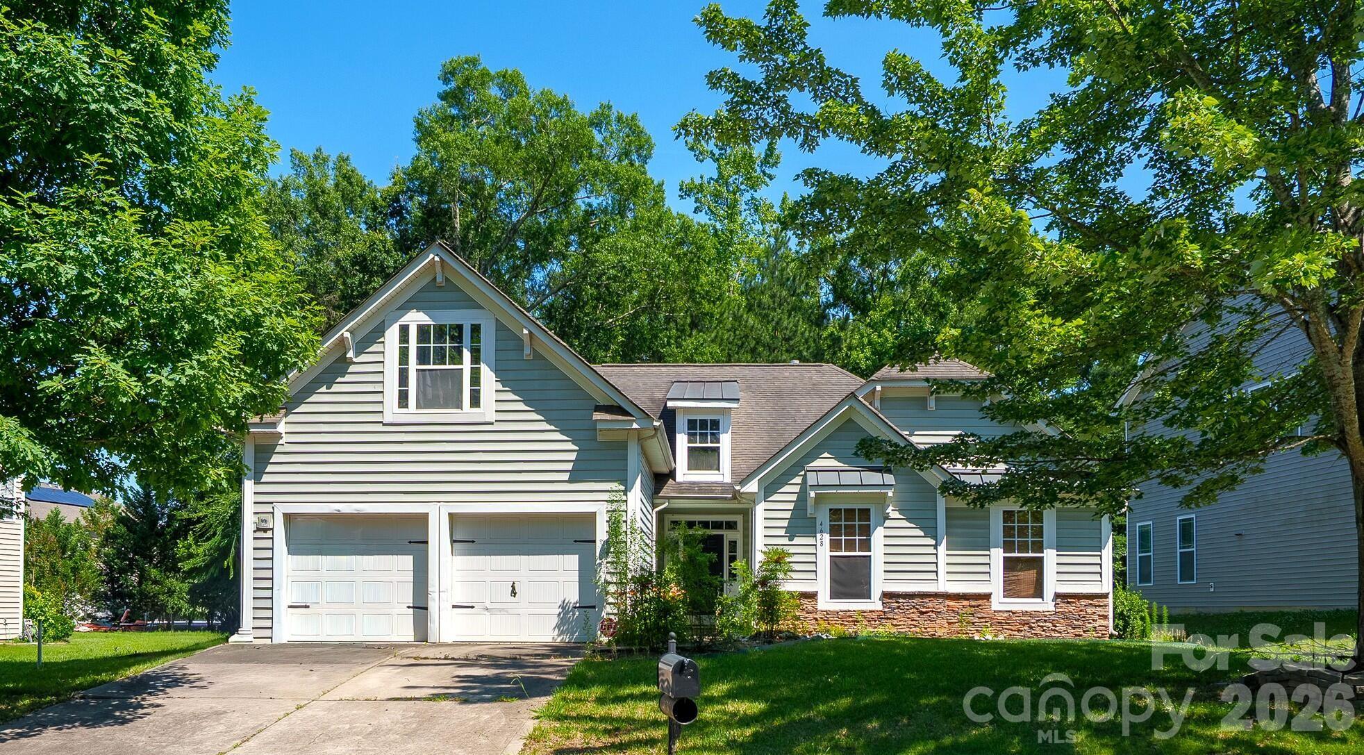 4628 Bonroi Avenue is a well-maintained four-bedroom, three-bath single-family home in a quiet, established neighborhood in Charlotte's University City area, blending comfortable living with the finishes today's buyers want. Inside, granite countertops, hardwood floors, and a cozy fireplace create a warm, upscale feel across a spacious, functional layout. The home comes complete with the refrigerator, dishwasher, washer, and dryer, so you can settle in right away. A two-car garage adds secure parking and storage, while the low-maintenance vinyl exterior and slab foundation keep upkeep simple, with no known structural issues. The HOA community allows long-term rentals, a plus for homeowners and buyers seeking a dependable property. Served by city water and sewer, and not in a flood zone. Close to University City, shopping, dining, parks, and major roadways across northeast Charlotte. A comfortable, well-located Charlotte home ready to enjoy.