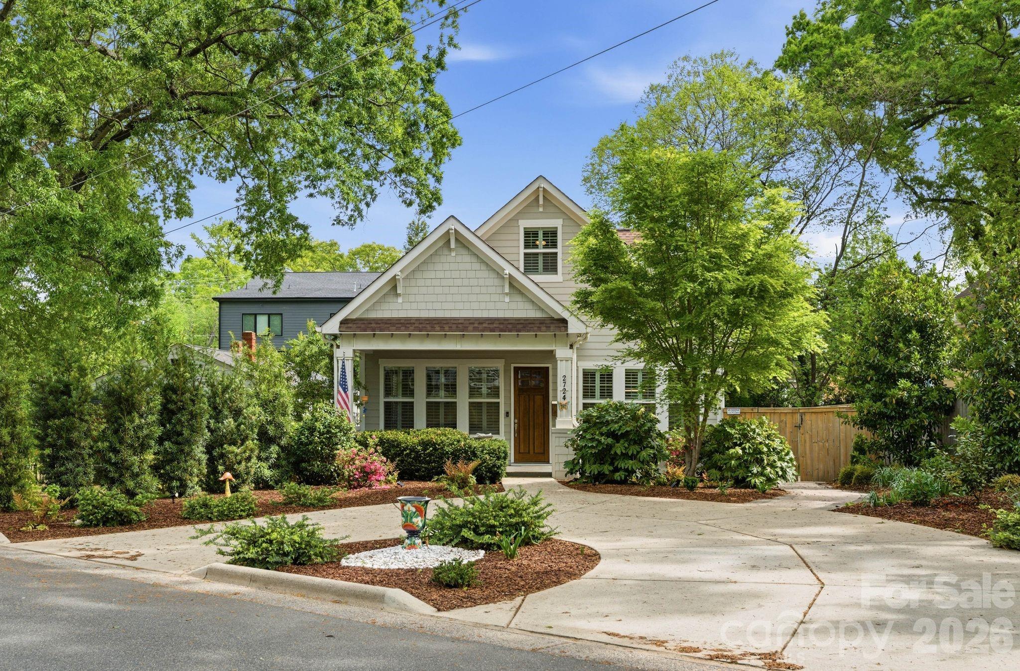 Welcome home to this charming Craftsman-style retreat in the heart of Villa Heights—one of Charlotte’s most dynamic and desirable neighborhoods. Perfectly positioned within walking distance to the best of the area, this location offers an unbeatable lifestyle just 10 minutes to Uptown and only 5 minutes to the hotspots of Plaza Midwood and NoDa.

This beautifully designed three-bedroom, three-bathroom home blends timeless character with modern comfort, offering the ideal mix of privacy and convenience. Inside, the kitchen is truly a showstopper—featuring stainless steel appliances, granite countertops, and an open layout that flows seamlessly into the main living and entertaining spaces.

The main level hosts a spacious primary suite complete with a private en-suite bathroom, creating a peaceful retreat. Upstairs, you’ll find a versatile den—perfect for a media room, office, or flex space—along with two additional bedrooms and a shared full bathroom.

Step outside to enjoy a low-maintenance yard with added privacy, plus a circular driveway for easy access and extra parking—an uncommon find in this area.

Living here means you’re just moments from some of Charlotte’s favorite local spots. Grab dinner at Haberdish, explore the endless options at Optimist Hall, sip expertly crafted cocktails at Idlewild, or catch live music at The Evening Muse—all just minutes from your front door.

If you’re looking for a home that delivers charm, functionality, and walkability to some of the city’s best dining, nightlife, and culture—this Villa Heights gem checks every box.