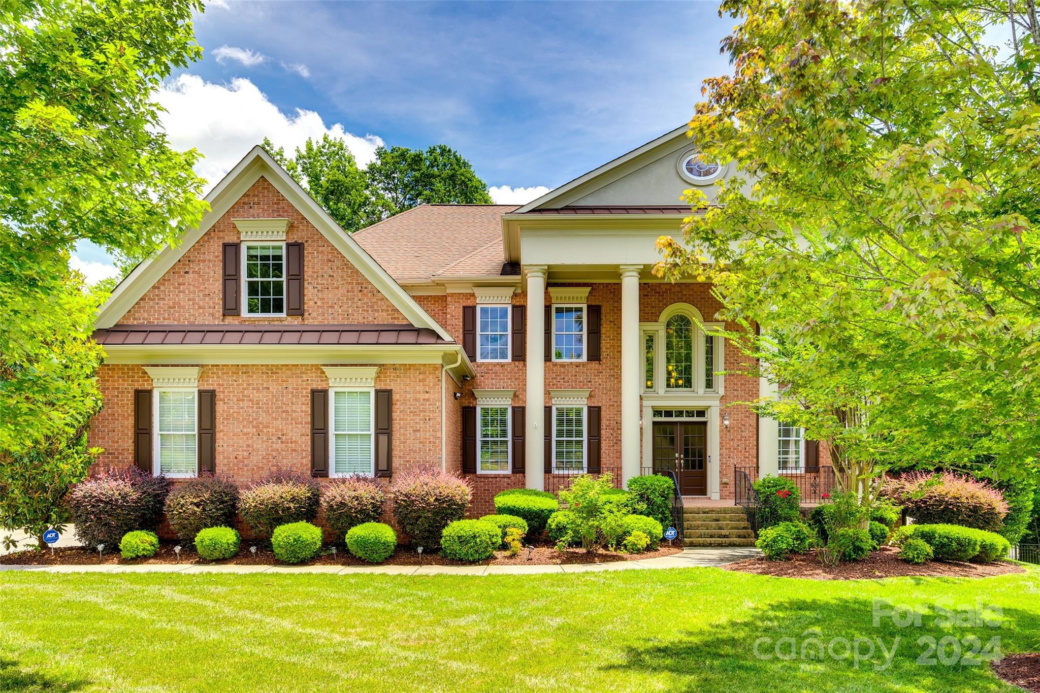 Discover unparalleled luxury at 6077 Arundale Lane in The Woods section of the prestigious Bridgemill subdivision. This full brick two story home is situated on a quiet cul-de-sac lot and showcases sophisticated craftsmanship and elegant design throughout its expansive floor plan. As you enter, you’ll notice the grand curved staircase in the two-story entryway, which leads into a generous living area that is highlighted by a gas fireplace and ample natural light. Entertain with ease in the gourmet chef's kitchen, equipped with high-end appliances, custom cabinetry, and a spacious island. Retreat to the lavish primary bedroom suite upstairs, complete with a spa-like ensuite bathroom and oversized walk-in closet. The basement offers a theatre room, an exercise room, and an additional bedroom along with plenty of storage space. Located in a desirable and amenity-filled neighborhood, with top-rated schools and convenient access to shopping and dining.