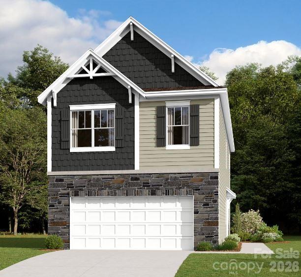 Welcome to the Catawba! This former model home is sold as is and does not include furnishings. Walk in from your private side entrance and you will be greeted with an open and inviting floorplan. The spacious kitchen, with an island for more space to cook and entertain, is complete with stainless steel appliances and a side-by-side door refrigerator. With our open floorplan, you have easy access to the family room to enjoy conversation and quality time. With enough space to easily fit a sectional, coffee table and other furniture, the family room is the perfect spot to unwind. Through the sliding doors is a private patio, perfect for entertaining or enjoying a morning coffee. You'll notice the home has been accented with window treatments throughout as well as easily maintainable EVP flooring on the main level. Take the staircase to the upper level, where you'll find a loft,  two additional bedrooms and the secondary bath that is easily accessible to the additional bedrooms to ensure everyone is satisfied. The same-level laundry room will make laundry days a breeze with the included washer and dryer. Finally, the spacious owners bedroom with ensuite will allow for maximum privacy and comfort, with enough space to fit a king size bed as well as other furniture. The en-suite features a tiled shower, dual vanity & private toilet area. The walk-in closet is spacious enough to accomodate any size wardrobe.