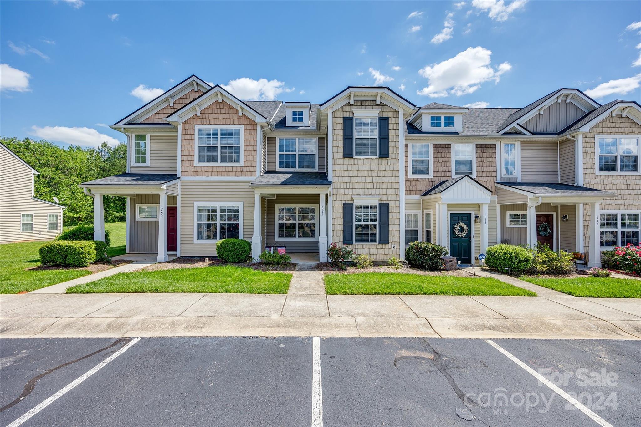 Welcome to this charming 2-level townhome ideally situated in Rock Hill, this delightful residence boasts a cozy floorplan, complete with a welcoming fireplace, offering a warm and inviting atmosphere. Featuring 2 bedrooms and 2.5 baths, this townhome is designed for comfort and convenience. The kitchen is equipped with ample counter space and cabinets for all your storage needs, The bedrooms and baths provide the perfect retreat for everyday living offering a tranquil space to unwind and relax. Step outside on the patio and enjoy the outdoors and relax after a long day. Don't miss out on this opportunity to make this house your home. Great Location and comfortable living space.  Schedule a showing today!