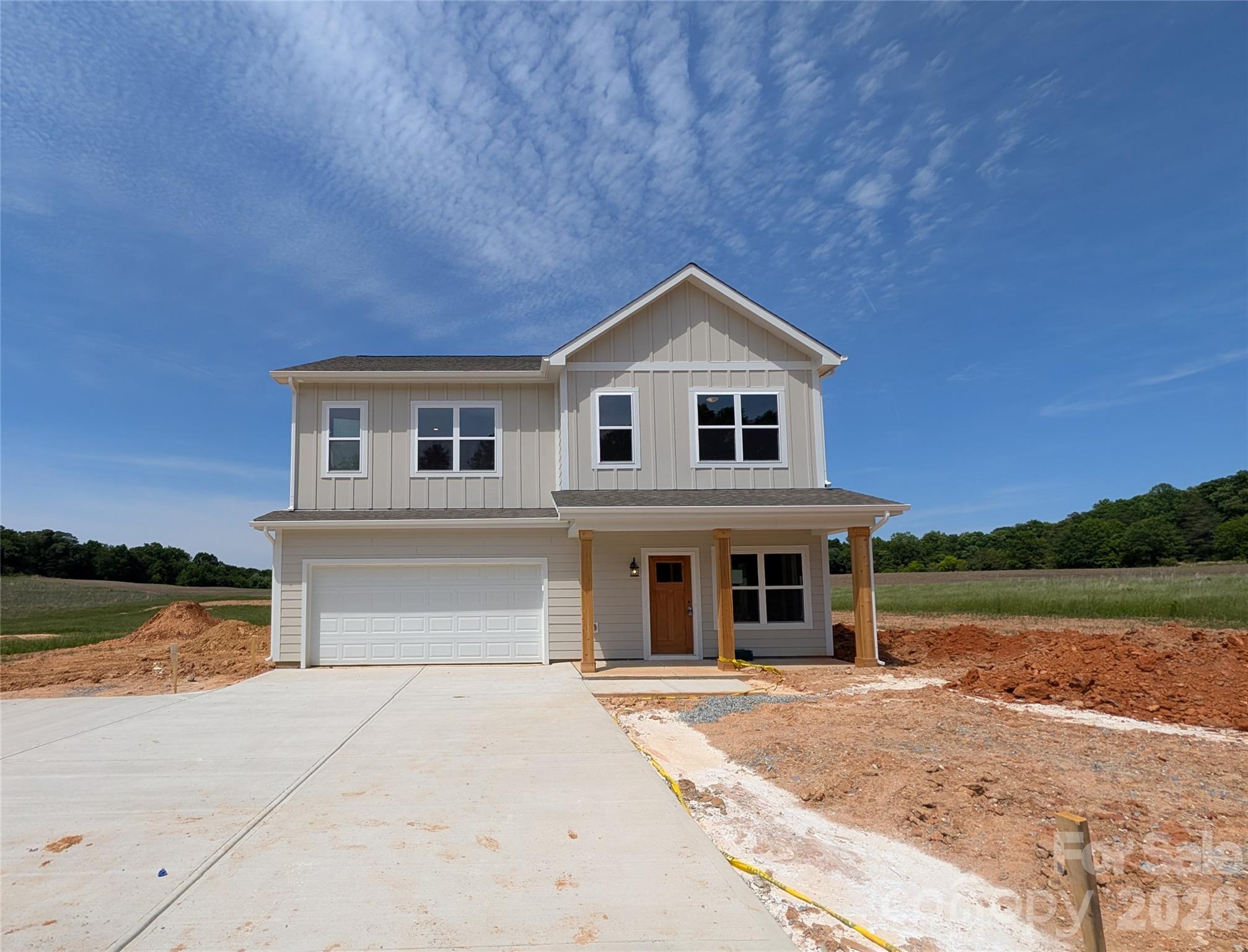 This nearly completed new construction offers a beautiful home with an inviting kitchen that features a large island and a pantry. The open layout combines the living, dining, and kitchen areas, creating a spacious feel. The main level also includes a half bath, an office, and a large sunroom. Additional features of the home include a covered porch and a two-car garage.

On the upper level, you will find four bedrooms and two full baths. There is an extra bonus room that could serve as an additional office, playroom, or sitting area. For added convenience, the laundry room is located on the upper level. This home will be completed soon, and professional photos will be available shortly.