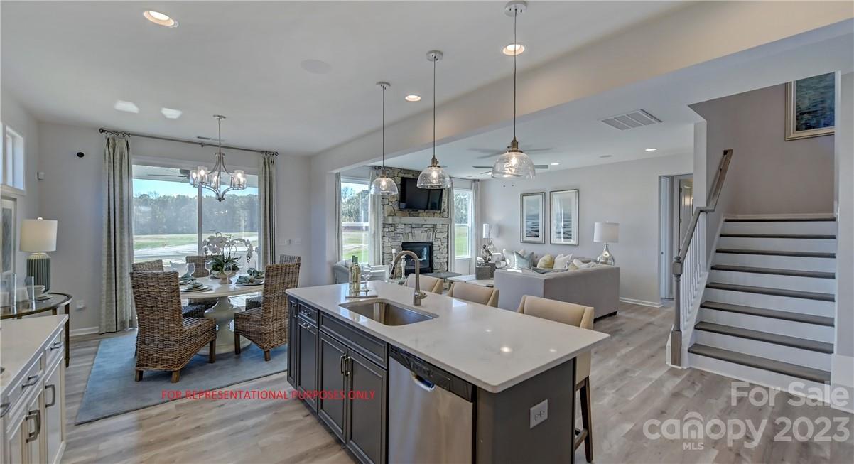 MLS # 4055175 REPRESENTATIVE PHOTOS ADDED.  The Waverly is a captivating floor plan with a first-floor guest suite, study and  spacious gathering room with fireplace and a bright open kitchen allowing plenty of entertaining power. The second-floor owner’s suite connects to the spa bath with dual vanities, shower, tub and two walk-in closets. A spacious loft makes for a great play space or media room while the three additional bedrooms offer plenty of private space for everyone. This home features a third floor with a full guest suite and large game room! Structural options include: Study, gas fireplace, third floor loft with attic suite, sunroom.