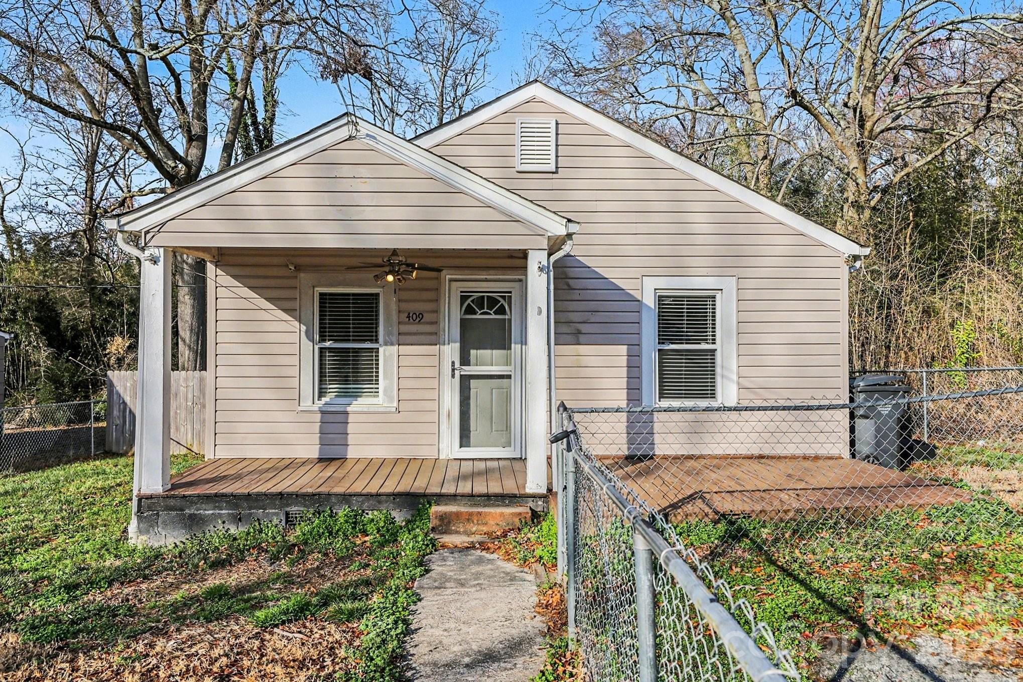 Welcome to 409 S Maple Street, a delightful and well-maintained 2-bedroom, 1-bathroom home nestled in the heart of Dallas, North Carolina.
Built in 1940, this charming single-story home offers 726 square feet of comfortable, move-in-ready living space. Perfect for first-time homebuyers, downsizers, or anyone seeking low-maintenance living with thoughtful modern updates, this home blends classic character with modern convenience.
Inside, you'll find a bright and inviting interior filled with natural light. The efficient floor plan features two comfortable bedrooms, a full bathroom, and a functional kitchen complete with modern appliances and casual dining space. Additional highlights include central heating and air conditioning, plus a tankless water heater for improved energy efficiency and endless hot water on demand.
Outside, the home sits on a generous 0.21-acre lot with a unique fully fenced front yard—perfect for privacy, pets, gardening, or simply enjoying the outdoors. The spacious backyard offers plenty of room to relax or entertain.
This turnkey property is ready for its next chapter. Don’t miss your chance to make 409 S Maple Street your own—schedule a showing today!