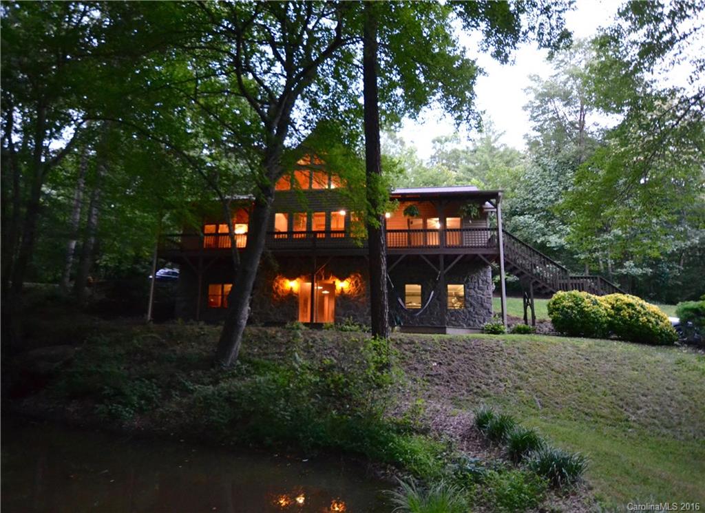 Beautiful home in a lovely wooded setting with it's own small spring-fed pond. Enjoy the tranquillity of this quiet neighborhood near the town of Clyde with a spacious great room and lots of glass to see out. Finished beams add to the quality appearance of this 3/3 home with both upper and lower driveways for ease of entry. New SS appliances and new carpet in the bedrooms give the feel of a much newer home. Lower level has a large family room, office, and bedroom as well as the 2 car garage.