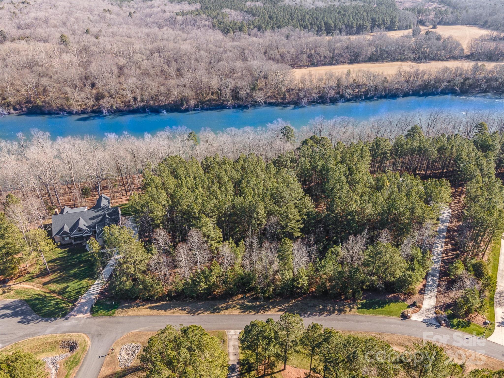 Build your dream home on this stunning waterfront lot in the highly sought-after Catawba Shores Estates! Nestled just steps from the serene Catawba River, this rare opportunity offers the perfect setting to create your own slice of paradise. This custom community features top-notch amenities, including a clubhouse, pool, canoe/kayak launch, and scenic walking trails. The property requires a well and septic system to be installed by the buyer. A completed soil report (January 2019) and survey, along with the community's CCRs and bylaws, are included in the attachments. Let your vision come to life in this exceptional riverside location!