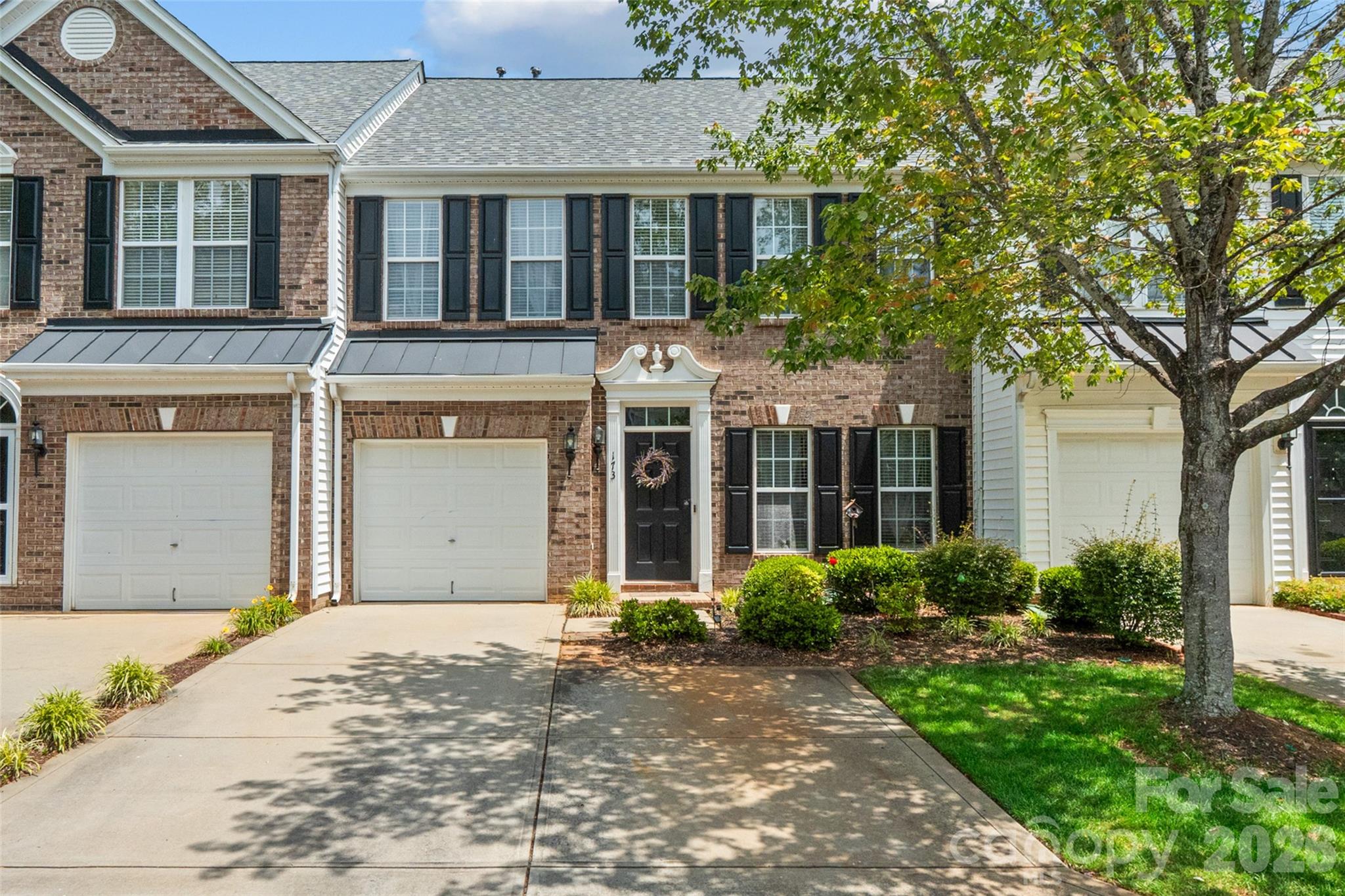 Welcome to modern comfort in the heart of Fort Mill's highly sought-after Fairway Townes. This beautifully updated 3-bedroom, 2-bathroom townhome offers a bright and inviting interior featuring a contemporary kitchen with stylish finishes and a fresh, open feel. The main living areas are highlighted by durable vinyl plank flooring, while the bedrooms offer plush carpeting for added comfort. Step outside to your own private oasis. A rare, fenced-in backyard that provides the perfect secure space for pets, play, or weekend entertaining. Situated in an amazing location within the Springfield area, you'll enjoy proximity to top-rated schools. Built in 2006, this move-in-ready gem combines the peace of a easy living with the modern updates today's buyers crave.