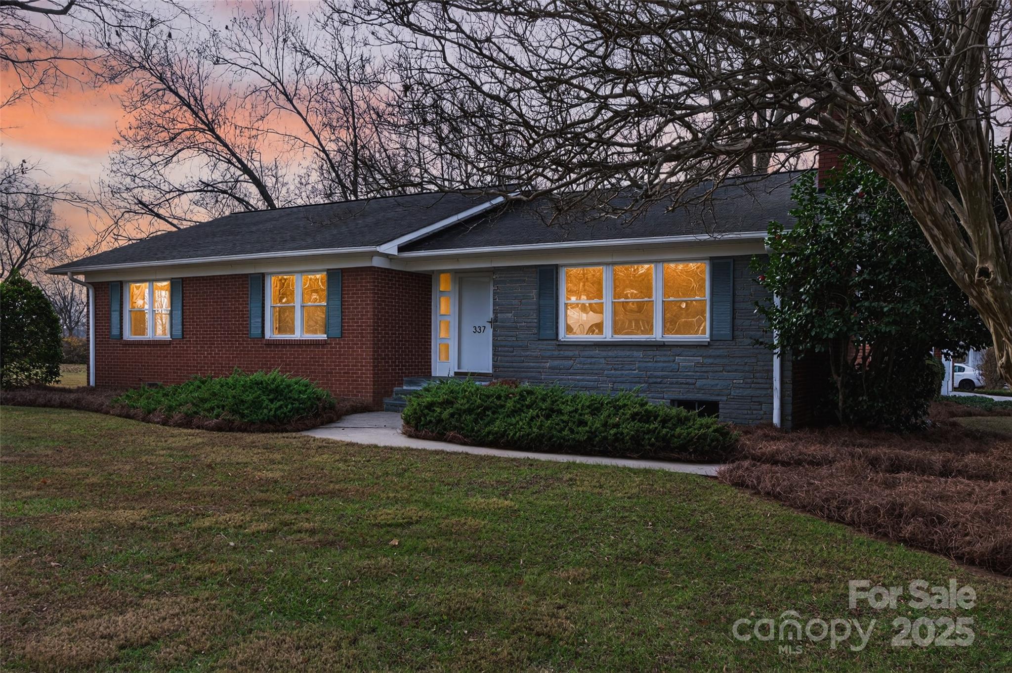 Seek and ye shall find…Live the good life right here n Rockwell NC where life is slower & un rushed.    This Home is IMMACULATE with lots of custom touches & far from cookie cutter.  All BRICK with slate stone accents.  Beautiful real solid oak hardwood floors.  Trane Heat pump 2024, Generac automatic generator.  Masonry fireplace, slick sheet rock ceilings with recessed lights.  Kitchen has stainless steel farm style sink, wall oven,  Island with smooth surface cooktop.  Lots of custom solid wood cabinets with nice metal hardware, and ample countertop space.  Primary suite features full bathroom with walk in shower, walk in closet, full length door mirror perfect for getting dressed all efficiently situated near the laundry space!  Living room has lots of natural light with triple front windows & solid wood front entry door with 3x 3 glass side panels.  Knock and the door shall open… Attached 2 car side entry garage with painted floors, 2 garage doors with automatic openers with integrated camera system.  Full hall bathroom has tile floors, tile floors , tub shower combo, vanity with counter space drawers, cabinet, updated fixtures & full sized mirror.  Functional floor plan flows nicely from the kitchen, living  room , dining room & den which over looks patio & rear yard via floor to ceiling wall to wall sliding glass doors.  Beautiful basement with interior, exterior access, wood stove, tile shower, lights, outlets, painted walls, floors, & ceilings.  Covered rear stoop leads to beautiful brick paver patio which also accesses the den, garage and basement.  Phenomenal flat corner lot n  a-half has perfect front yard, just right landscaping including a Japanese maple tree, 3 mature pecan trees, & clear side yard that would be great for just about anything like gardening, personal vineyard, orchard, soccer, golf, basketball, batting cage, football, frisbee, sunbathing or bird watching.  Lots of added nice touches gutter yards, vinyl replacement double hung windows, gutter downspouts piped unground with pvc.  Freshly painted & one of the cleanest houses I’ve ever seen in my 25 years.  Great location in downtown steps from: Rockwell Cafe, F&M Bank, Morning Glory Coffee Boutique, Ace Hardware, Bojangles, Medley Electric Heating & Air, Danny’s Place, Hardee’s, Rockwell Elementary, Erwin Middle ,East Rowan High Schools, First Baptist Church Rockwell, & St James Lutheran Church.  Very close to Granite Quarry & Faith NC. You could easily live here without owning a car and or driving very little.   Only 10 minutes from Interstate I-85 halfway between Charlotte   & Greensboro NC, only 2.5 hours to mountains & 3 hours to the beach.   Enjoy one of the best youth baseball & softball programs in the country from tee ball to high school, American Legion, state & little league world champs, collegiate & even professional minor league baseball nearby.  Stay active with tennis courts, parks, community YMCA & social events nearby.   Find friendly faces & helping hands everywhere, high freedoms, & a slower pace.   No 6...7...here only A1A Aura, & triple 7 rizz.  It’s pretty close to perfect, schedule to fall in love with it TODAY  Ask & ye shall receive.