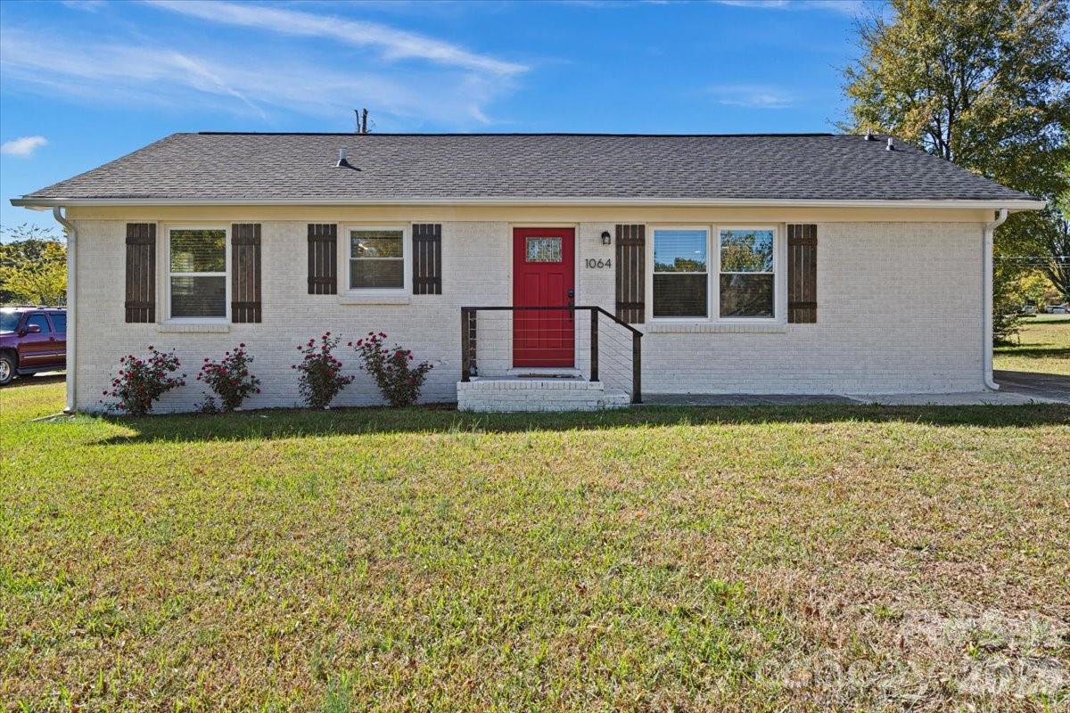 An updated, move-in ready brick ranch that's packed with upgrades inside and out. This 3-bedroom, 2-bath home offers peace of mind with a new roof (2024), HVAC heat pump (2024), and water heater (2024), meaning the major systems have already been replaced. Inside, you'll find a bright, open living space that flows into a beautifully renovated kitchen featuring quartz countertops, stainless steel appliances, and modern finishes. Both bathrooms have been thoughtfully updated, while neutral paint and stylish finishes throughout create a clean, contemporary feel that's ready for its next owner. Situated on a spacious lot in an established neighborhood with no HOA, this home offers convenient access to I-77, shopping, dining, and downtown Rock Hill—making commuting to Charlotte a breeze. Whether you're a first-time buyer, downsizing, or looking for a turnkey investment, this home checks all the boxes.