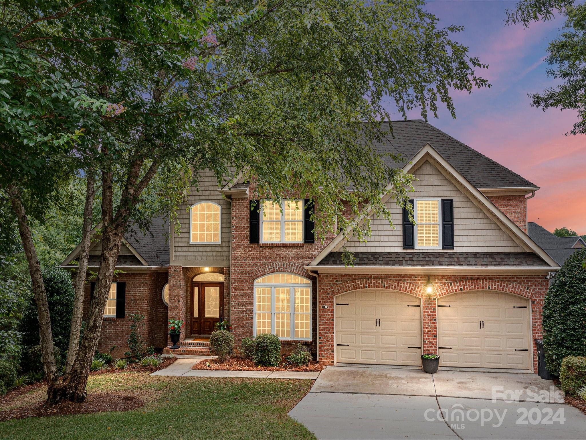 Enjoy the Serenity & Beauty of Nature from one of TWO Private Decks that Overlook the Lake. Located in quiet cul-de-sac, this Custom Built Full Brick Hm offers Convenience to Services & Road Systems. Architectural Features include: Vaulted Ceilings, Tray Ceilings, Site Finished Hardwds, 2 Fireplaces, Iron Balusters on Staircase, Upgraded Cabinetry & Finished Basement! Glamorous Primary on Main w/Dbl Tray Ceiling & Views of Lake! Vaulted Primary Bath was Updated: Walk-in Shower w/Frameless Shwr Door, Tiled flrs & Shwr Surround. Vanity w/Quartz Cntrs, Newer Fixtures & Framed Mirrors! Vaulted Ceilings in Breakfast Rm, Living Rm, Family Rm. Kitchen Updated w/Quartz Cntrs, Under Counter Lighting, Subway Tile B/S. 5 Burner Gas Oven/Range. Fabulous Basement Boasts of Large Rec Room w/Stacked Stone Fireplace, Billiard area, Kitchenette w/Granite Counters & Wine Bar, Card Rm/Brkfst Rm, Exercise Rm, 5th Bedroom adjacent to Full Bath! FABULOUS Walk-in Closet Storage & Lrg Workshop area in Bsmt.