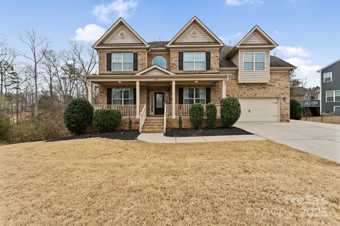 This stunning 6-BR/5BA home in the sought-after gated community of Kimbrell Crossing in Fort Mill just hit the market. Step inside to discover a newly renovated gourmet kitchen featuring stainless steel appliances, gas cooktop, and a wall oven, perfect for culinary enthusiasts. The open floor plan is enhanced by beautiful hw floors that flow throughout the main level, stairs, and hallway. The main floor offers a guest bedroom, office, LR & dining areas,  full bath, and laundry room. Upstairs, the luxurious primary suite boasts a deep soaking tub, tiled shower, dual vanities, and spacious closets, 3 additional bedrooms share 2 beautifully designed baths. The finished walkout basement is a true gem, complete with a kitchenette, full bath, bedroom, exercise space, and an entertainment room—perfect for guests, in-laws, or a private retreat. With its thoughtful design and spacious layout, this home is ideal for multigenerational living, providing a space for everyone.