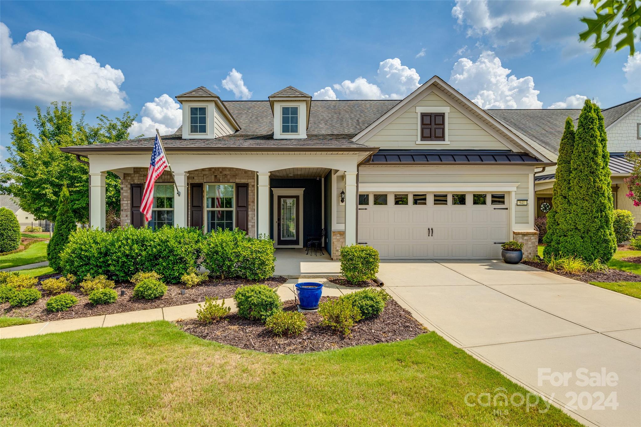 This beauty was once the model home. Now it's even more beautiful. With the addition of engineered wood floors throughout, fresh paint, brand new kitchen quartz and kitchen appliances this house is sure to stand out. Tons of electrical upgrades including dimmers, new lighting, recessed lights, additional garage lighting, garage keyless entry and more! Enjoy coffee on the screened in porch and watch the birds enjoy the landscaping. Quiet cul de sac on a corner lot near all of the amenities. Come and visit this beauty!