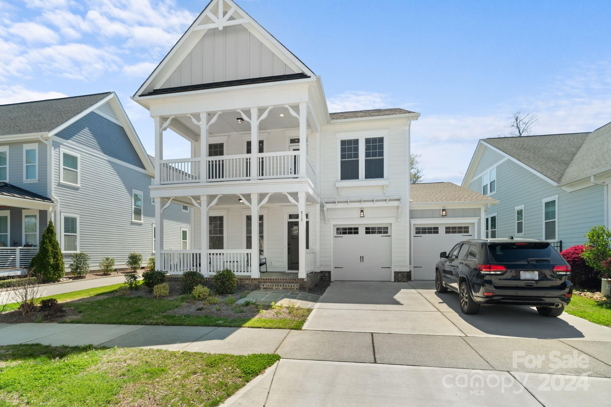 Welcome to your dream home in the desirable Riverwalk community, just two years young! This stunning home boasts a spacious main level featuring a cozy great room with a fireplace, a formal dining room, and a chef's kitchen complete with a massive island featuring a breakfast bar, granite countertops, stainless steel appliances, including a gas range, and a convenient walk-in pantry. As you enter from the attached two-car garage, you'll find a convenient drop zone. The main level also offers a secondary bedroom and a full bathroom for added convenience. Upstairs, retreat to the luxurious primary suite, showcasing a generous sitting area, a balcony, dual sinks, a walk-in closet, and a beautifully tiled walk-in shower. Additionally, there are two more bedrooms upstairs and a spacious laundry room equipped with a sink. Enjoy relaxing evenings on the large front porch or entertain guests in the fenced backyard. Don't miss out on the opportunity to make this exquisite home yours!