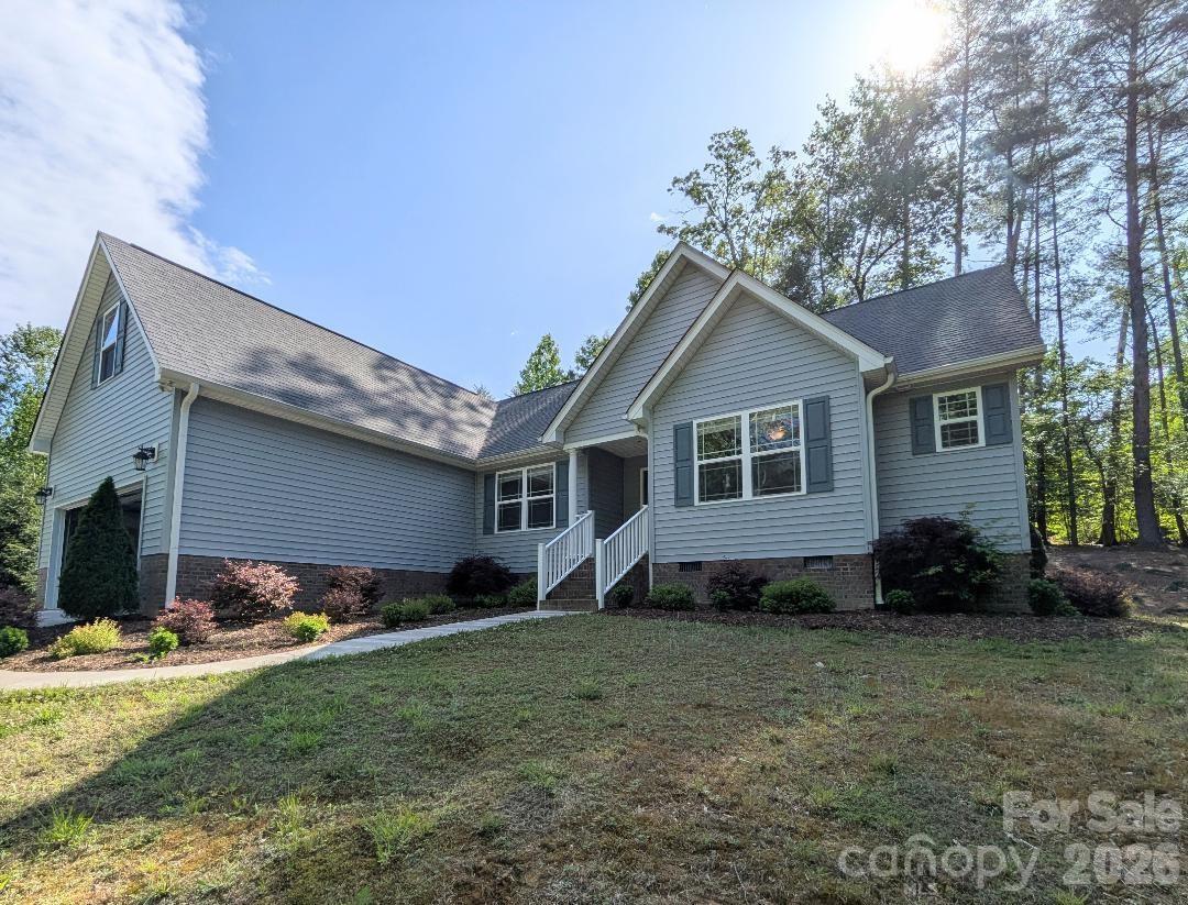 Welcome home to this lovely home in Brookstone subdivision. Situated on over an acre with a small creek running through. Step inside to a spacious living area featuring vaulted ceilings that create an open feel. The well-designed kitchen is designed for both everyday living and entertaining, complete with a double-door pantry and easy access to a large dining area. This home features three bedrooms, two of which share a large bathroom and both have generous closets. Just down the hall, the private primary suite provides a large bedroom, walk-in closet, and a custom-tiled rainfall shower. Above the two-car garage, you’ll find a versatile flex room. A conveniently located laundry room sits just off the garage. Outside, the backyard includes a fenced-in area for pets or entertaining.
