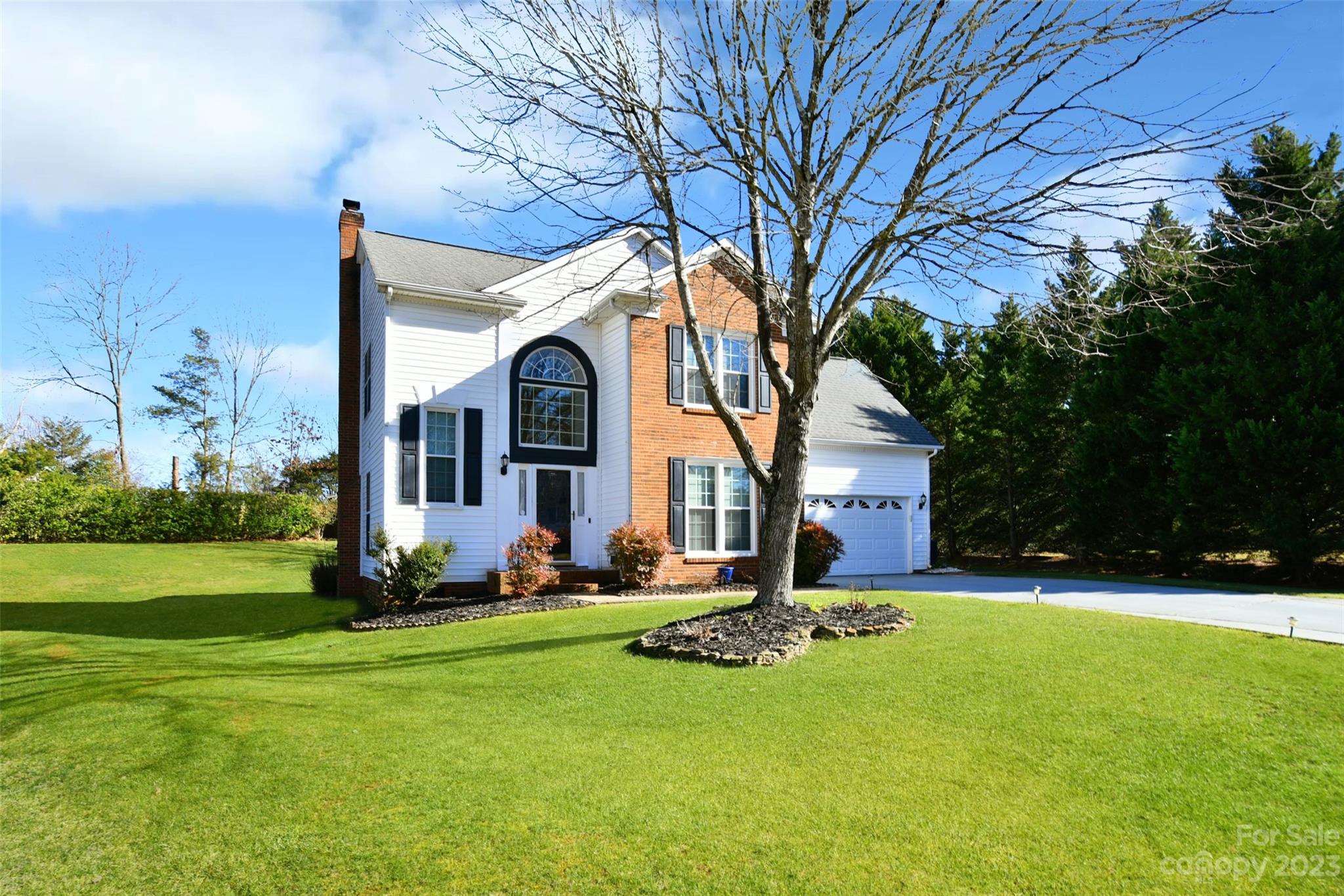 Don't miss this beautiful 2-story home in the desirable Wilshire Manor neighborhood in Steele Creek on a huge cul-de-sac lot! From the gorgeous peaceful koi pond to the sunroom with bar area to the fabulous location, this home has it all! On the main level, there is a formal dining room and an open great room with fireplace and lots of room to entertain- especially in the sunroom overlooking the massive backyard. On your way to the large garage, there is a laundry and mud area. Upstairs, there is a lovely primary bedroom with a stunning spa-like updated en-suite bathroom and two additional ample bedrooms/bath and a huge, flexible bonus room. The backyard of this home feels serene and private and with over half an acre and wired outbuilding- almost impossible to find in a neighborhood! The outdoor living area and pond are simply a must-see.