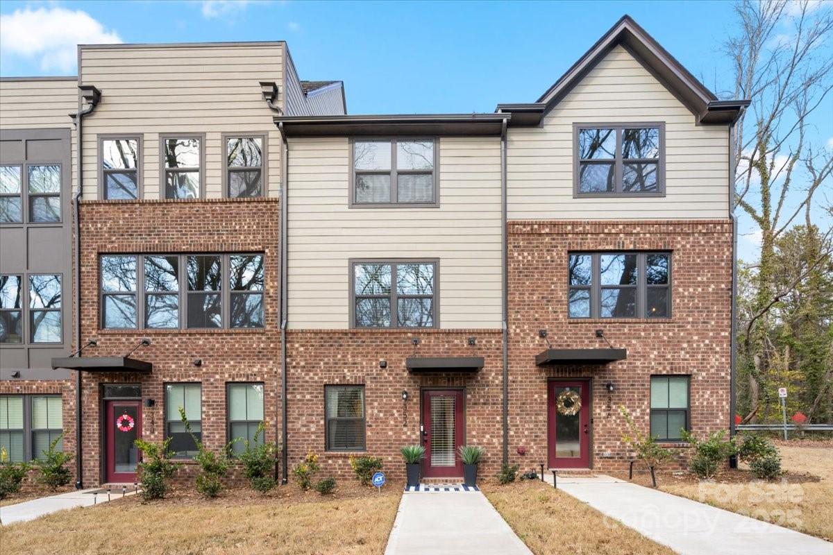 POV: Townhome living in NoDa, with a Greenway style vibe! This rare gem townhome in NoDa offers tree-lined privacy in both the front and back, for a perfect blend of modern living and peaceful retreat. Built in 2024, with 3-bd, 3.5bth featuring double primary suites up, 1-car garage, and still covered under the builder’s 1-2-10-year tsfr-able warranty. 
The main level offers an open floor plan, spacious kitchen, island, added cabinetry, dining area +peninsula for additional seating. Recent upgrades include new paint, custom closets in the primary bedroom, pantry, and hall closet, plus new blinds throughout.
Approx 1/2 mile from the Sugar Creek Lynx Blue Line, easy commute Uptown, UNCC, or South End. Plus, a short walk to NoDa hotspots like The Dog Bar, Smelly Cat, and The Goodyear House. Easy additional street parking available on Sweetbriar Street. $5k credit with acceptable offer.
Don’t miss this move-in-ready townhome offering comfort, convenience, and NoDa’s unique charm!