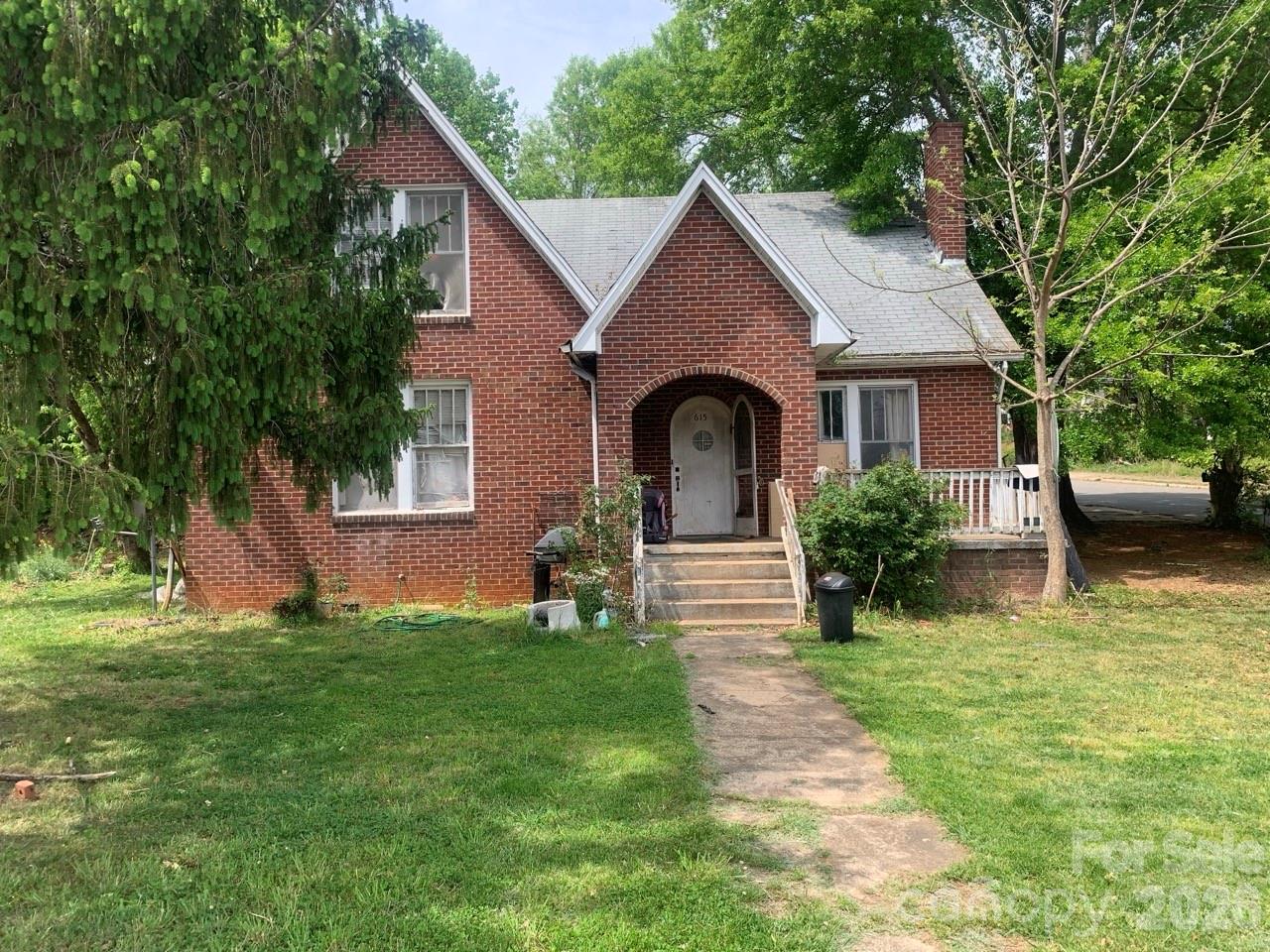 Charming 5-bedroom, 2-bath brick home built in 1941 on a spacious 0.39-acre lot in Morganton, NC. This 1,769 sq ft, 1.5-story residence features a fireplace, central heat & air, and a detached garage. Rents for $2,060 per month. Full basement  — can be purchased together with the adjacent 0.39-acre lot MLS#4385104 (zoned HID) for added space and versatility. Mature landscaping, convenient location, and classic character make this an ideal home for families or investors.
