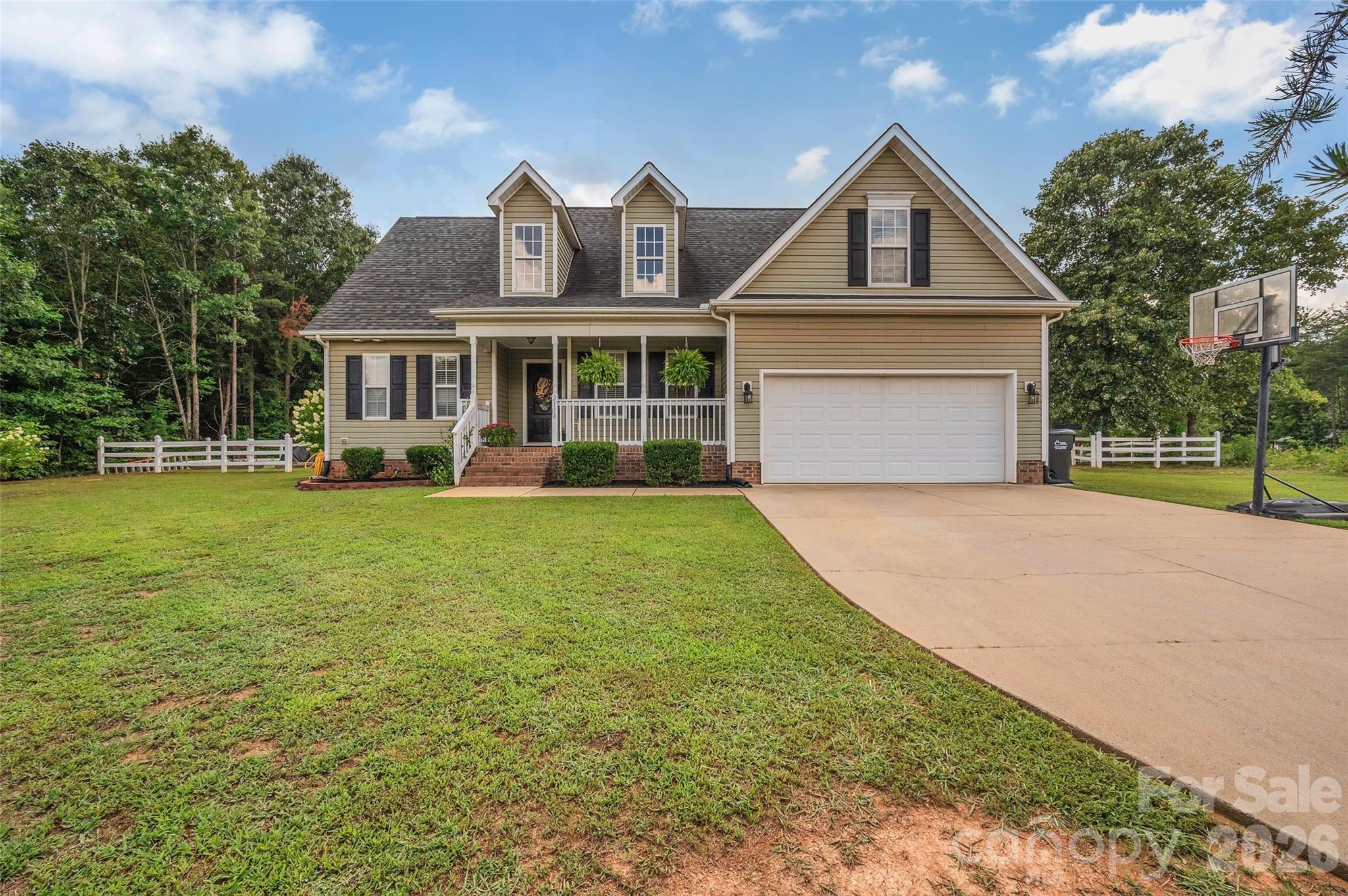 Welcome to this beautifully maintained 3-bedroom, 2-bath home situated on nearly an acre, offering the perfect combination of updated finishes and peaceful country living. Thoughtfully updated and move-in ready, this home features vinyl plank flooring throughout, offering a modern look that's both stylish and easy to maintain.

The open-concept living area flows seamlessly into the kitchen and dining spaces, making it ideal for everyday living and entertaining. The spacious primary suite offers a relaxing retreat with a beautifully renovated en-suite bathroom featuring stunning blue subway tile, a soaking tub, and a separate tiled shower.

Upstairs, a versatile bonus room provides the perfect space for a home office, playroom, media room, workout area, or guest space.

Outside, enjoy the privacy of the fully fenced backyard with plenty of room for pets, outdoor entertaining, gardening, or simply relaxing. The nearly one-acre lot offers the space and tranquility of country living while remaining just a short distance from downtown Kings Mountain, shopping, dining, and convenient access to I-85.

With tasteful updates, flexible living space, and a spacious lot, this home is ready for its next owners to move in and enjoy.