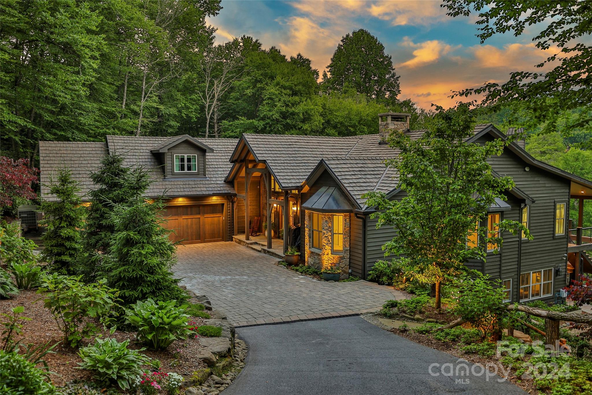 This extraordinary home promises an unmatched mountain living experience. 5 minutes to Main Street with upscale shops, delightful eateries and a multitude of entertainment options.  Meticulously updated this fully furnished residence awaits you. A quick golf cart ride leads you to the clubhouse for relaxation and social gatherings.
Gracious living spaces are designed to for your entire family, blending group enjoyment with individual privacy seamlessly. Viking appliances, a 48" dual fuel range, and a Miele coffee system effortlessly extends into the expansive outdoor area. Enjoy coffee in the am or a glass of wine at night amidst captivating views of the golf course and grand mountains.
A fenced flat yard offers space for you and your pets to roam. If you enjoy gardening, the raised bed area brims with vibrant flowers and lush foliage, offering a serene retreat. Embrace this rare chance to immerse yourself in the pinnacle of mountain lifestyle sophistication and natural beauty.