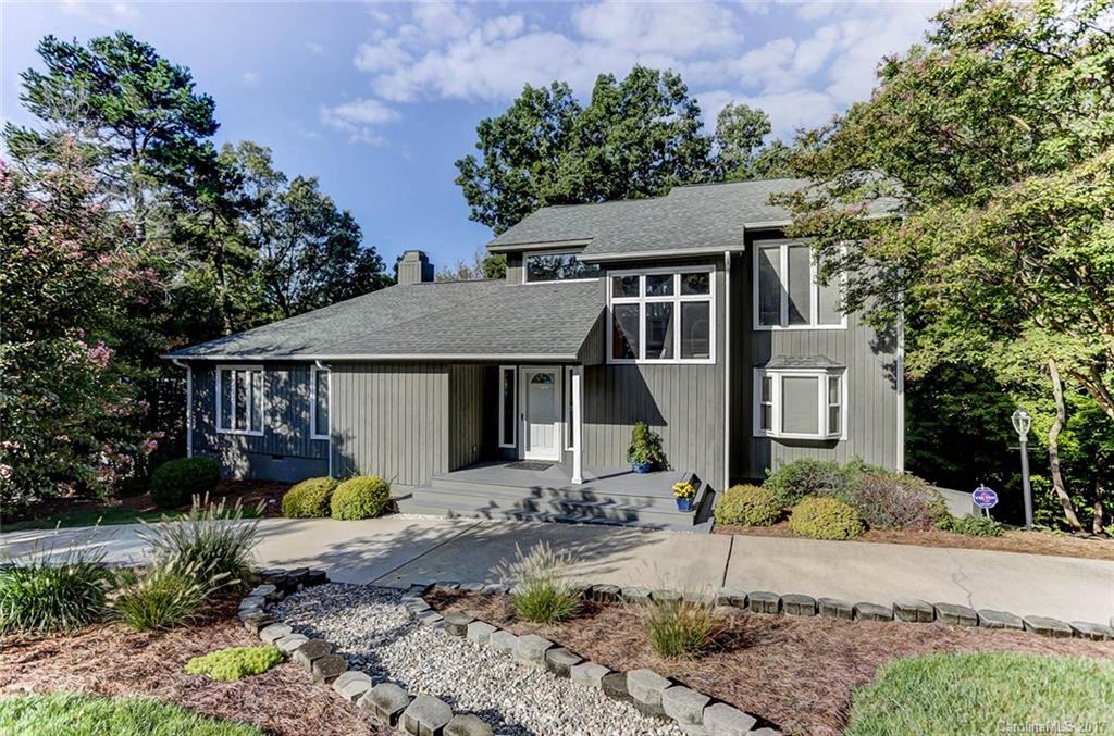 Gorgeous WATERFRONT home with amazing views and sandy beach. Boat lift and floating dock are perfect for living the lake life! Relax in the beautiful main floor master suite.  Gorgeous kitchen. Wood burning stone fireplace in the great room. Beautifully updated bathrooms!  Home warranty included.