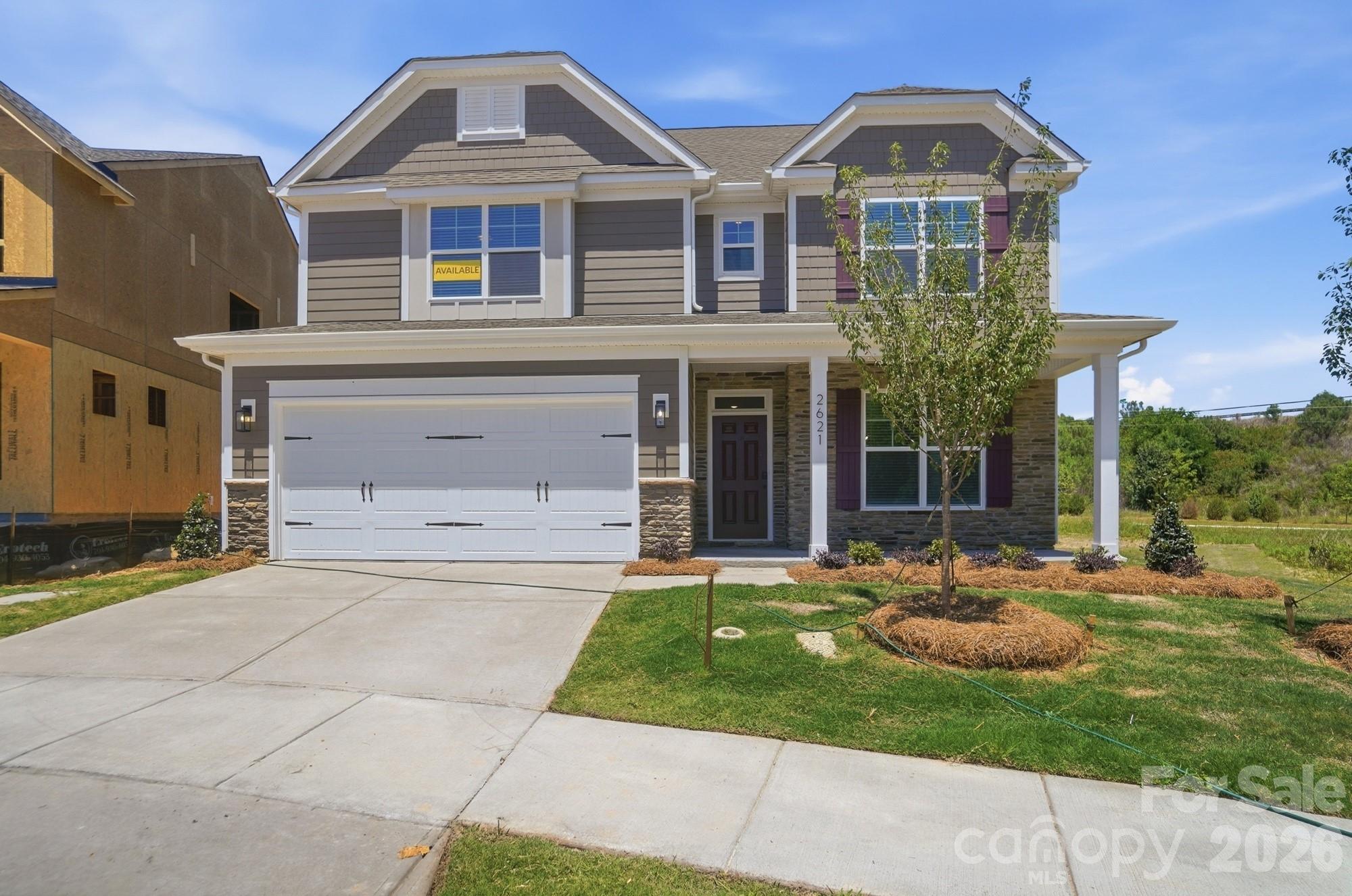 Welcome to Ashton Park, a new construction community in Monroe! This 3-story Davidson plan is situated in a quiet cul-de-sac and features 4 bedrooms, 3 full baths and more than 3,000 square feet of living space. The main level boasts an open floorplan with a kitchen that connects conveniently to a breakfast area and adjacent family room. On the main level you will also find a formal dining room with tray ceiling, a guest suite and full bath complete with quartz countertops. The kitchen has stone gray cabinets with matte black hardware, granite countertops, subway tile backsplash and stainless appliances, including an electric cooktop. The upper floor includes the primary suite with tray ceiling and additional sitting room space with French doors, two additional bedrooms, two full baths, loft, and laundry room. The primary bathroom features a shower with seat and tile surround, dual vanities and walk in closet. Find the large bonus room with closet on the third floor. Additional features include formal living room, quartz countertops in all baths, screened in porch and additional 12x12 patio. Community amenities include walking trails and a dog park.