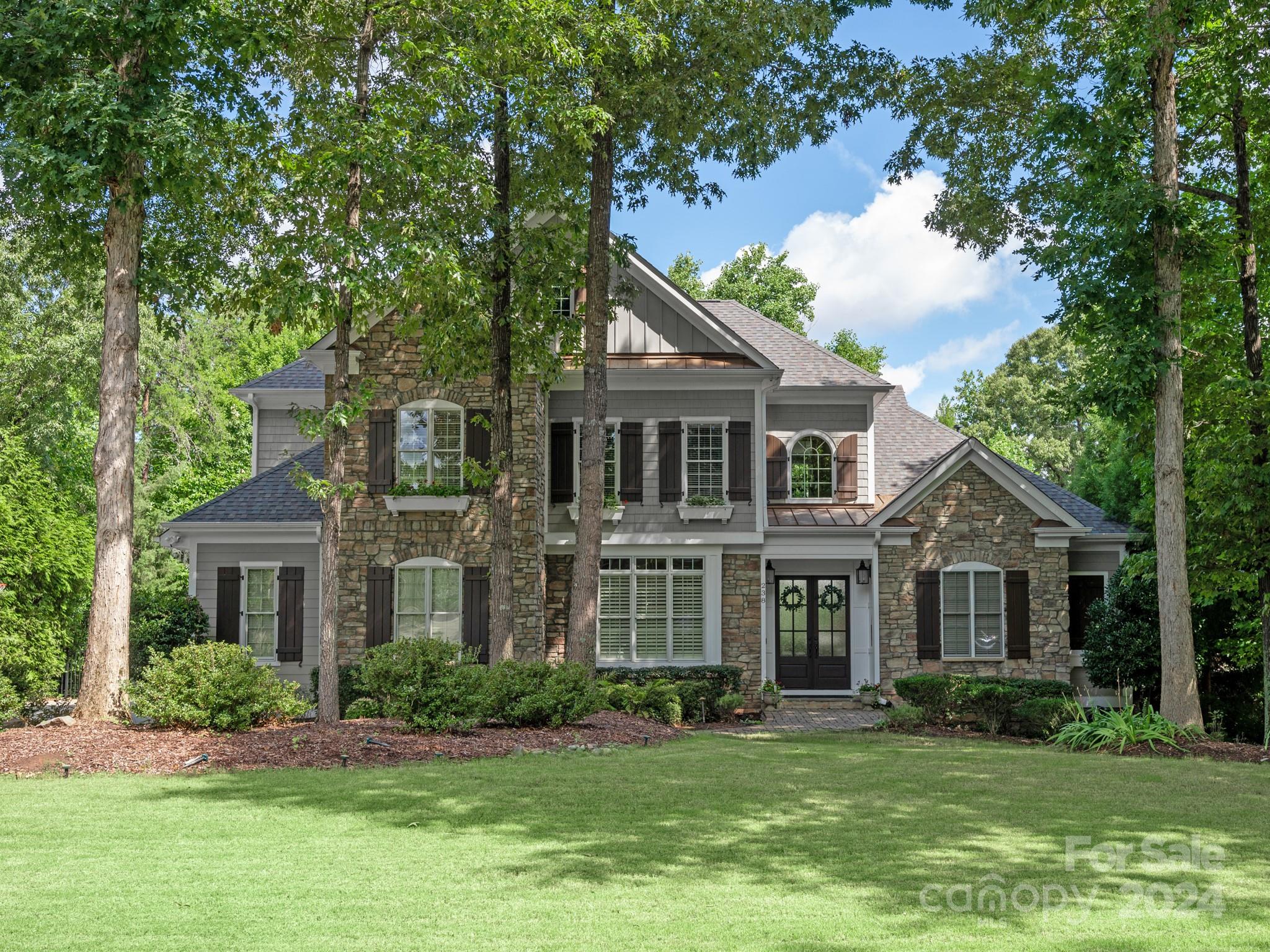 Custom Craftsman Springfield home w/finished basement;Inground salt water pool; EZE-Breeze Porch & on Golf Course. Check, Check, Check and Check -what more could you dream of?  Upon entering, you'll be greeted by the grandeur of real hardwood floors, two story foyer & a wall of windows in the Great Room letting the natural light shine in. The interior is adorned w/personalized light fixtures;Primary suite on main level; Full In law suite in basement; custom built in cabinetry throughout; trim moldings; vaulted & coffered ceilings & recessed lighting, creating a warm and inviting ambiance throughout.The gourmet kitchen is a chef's delight, featuring a breakfast bar, walk in pantry;SS Appliances;and an open layout that seamlessly flows into the comfortable living spaces. Entertainment options abound w/a media/recreation room (upstairs and basement), pool bathroom w/in steps of outside perfect for hosting gatherings & creating lasting memories.Community:(Clubhouse; pool, tennis, and etc).