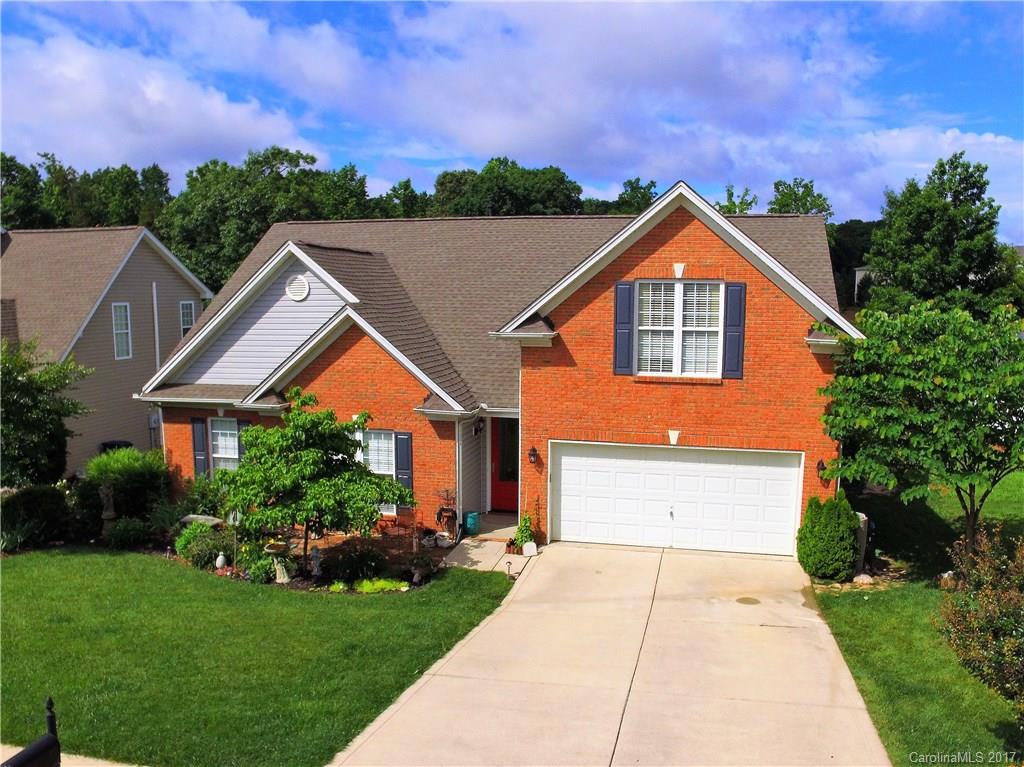 Beautiful home in the sought after Waterstone community. Home features impressive 9' entrance door, an open floor plan, great room gas log fireplace and 1st floor master. Kitchen has granite counters, breakfast area and stainless appliances. Spacious second floor bonus/bedroom. Master bath with dual sinks separate shower and garden tub. Private backyard features huge deck and backs to open space. Just minutes from dining/shopping and uptown. Must see, won't last.