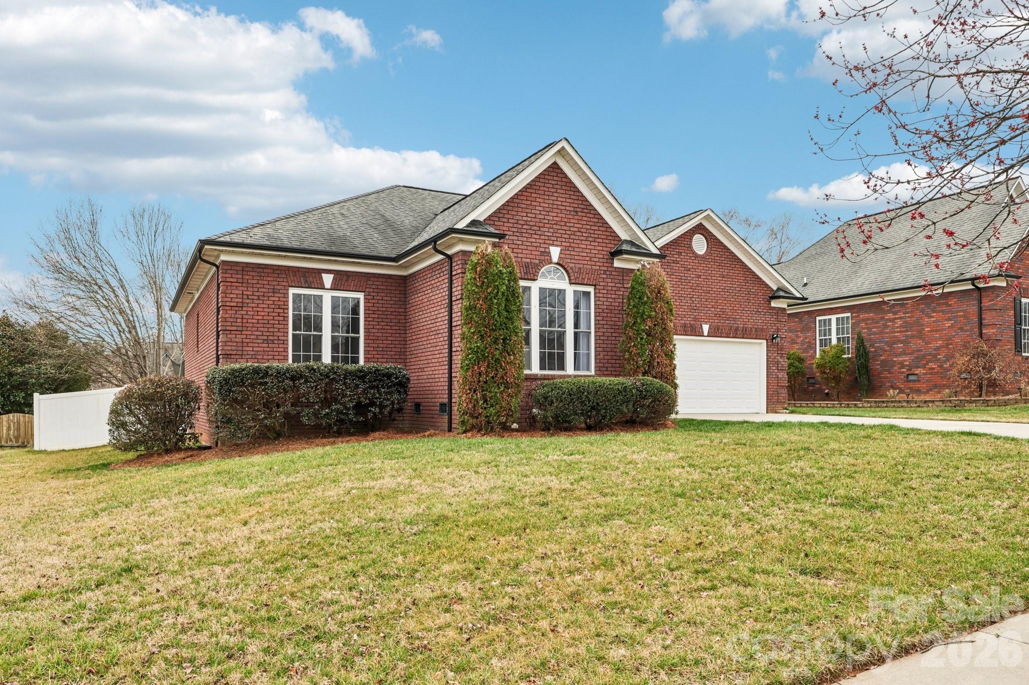 ABSOLUTE SHOWSTOPPER! Welcome to this move-in-ready, all-brick ranch home boasting 1,725 sq. ft. of pristine living space in highly desirable Locust, NC! Step inside to brand-new laminate oak flooring flowing seamlessly through the spacious living and dining rooms (June 2026), new linoleum in the laundry room, and plush new carpet in all three bedrooms (June 2026). The private master suite features fresh custom paint (May 2026) and a spacious layout. Peace of mind comes standard with a BRAND-NEW ROOF installed in June 2026!

Enjoy outdoor living at its finest with a fully fenced-in backyard, perfect for entertaining. Nearly all appliances convey, making this the ultimate turnkey opportunity just in time for the new school year! Nestled in a fantastic Stanly County neighborhood, you are just a short, convenient drive from Concord and Charlotte. Don't wait—schedule your tour today and move in before summer ends!