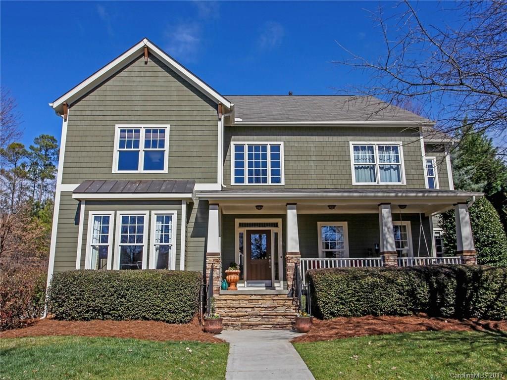 GORGEOUS Baxter Home Offering the Finest Details! Beautiful In-ground Pool with paver Patio surround. Front & Screened Porches. Hardwoods & tile throughout. Extensive millwork, arched doorways, wainscoting, surround sound & built-ins. Large Gourmet Kitchen with Island, Brkfst Bar, SS appliances, elec. cooktop, wall oven, granite, tile back splash and rich cabinetry. Incredible Mud/Laundry Room. Attached & Detached Garages! Enjoy the active lifestyle, restaurants, shopping &  amenities of Baxter!