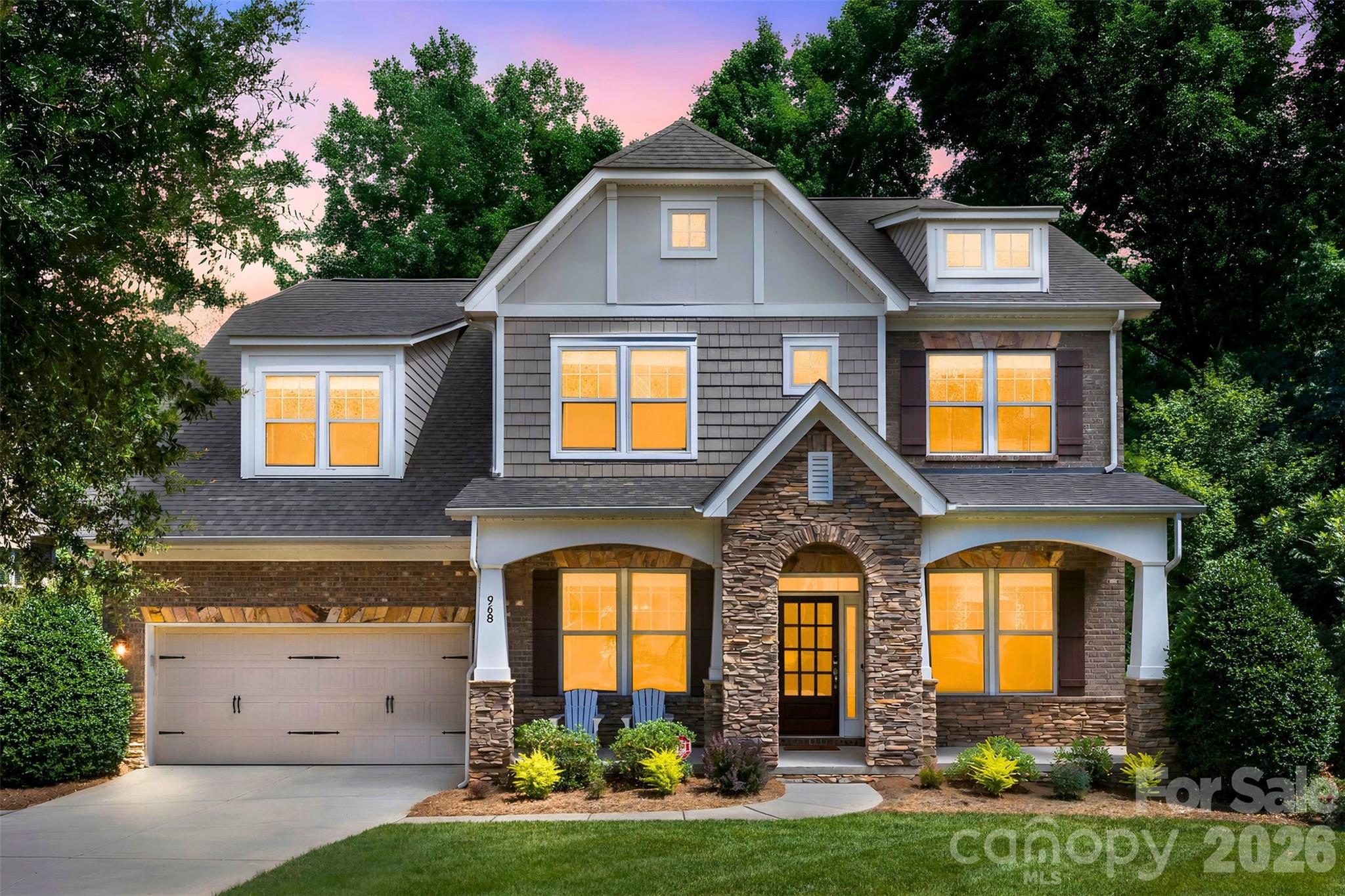 Now vacant and ready for it's new owners! Stunning home in the highly sought-after Barber Rock community, offering an unbeatable location in the heart of Indian Land just minutes from Ballantyne and Fort Mill. Enjoy convenient access to top-rated schools, premier dining, shopping, and everyday amenities. What truly sets this home apart is the incredible indoor-outdoor living experience. The finished walkout basement creates the perfect extension of the home, featuring a private bedroom, full bath, spacious recreation room, and a dedicated movie room complete with projector and screen ideal for entertaining. 

Outside, the expansive, level front yard provides exceptional usable outdoor space for recreation, sports, and everyday enjoyment. In contrast, the backyard serves as a private, low-maintenance retreat surrounded by mature trees and a peaceful wooded backdrop. Enjoy year-round entertaining from the covered patio, spacious deck and dedicated fire pit area, all thoughtfully designed to maximize enjoyment while minimizing upkeep.

Inside, the main level offers an open and inviting floor plan with rich hardwood floors and thoughtful design throughout. The spacious living room with gas fireplace flows seamlessly into a well-appointed kitchen featuring a gas cooktop & oven, large island, pantry, and stainless steel appliances. A formal dining room, private office, and bright breakfast area complete the main level. 

Upstairs, the expansive primary suite features a spa-like en-suite bath with garden tub, walk-in shower, and generous walk-in closet. Three additional bedrooms and a bonus room provide flexible space for family, guests, or work-from-home needs.

Additional highlights include a 3-car garage, surround sound, and included security system equipment. Community amenities include a clubhouse, outdoor pool, playground, and walking trails.

Offering the rare combination of a finished walkout basement, exceptional outdoor living spaces, a private wooded setting, and a prime Indian Land location, this home delivers the space, flexibility, and lifestyle that make it truly stand out.