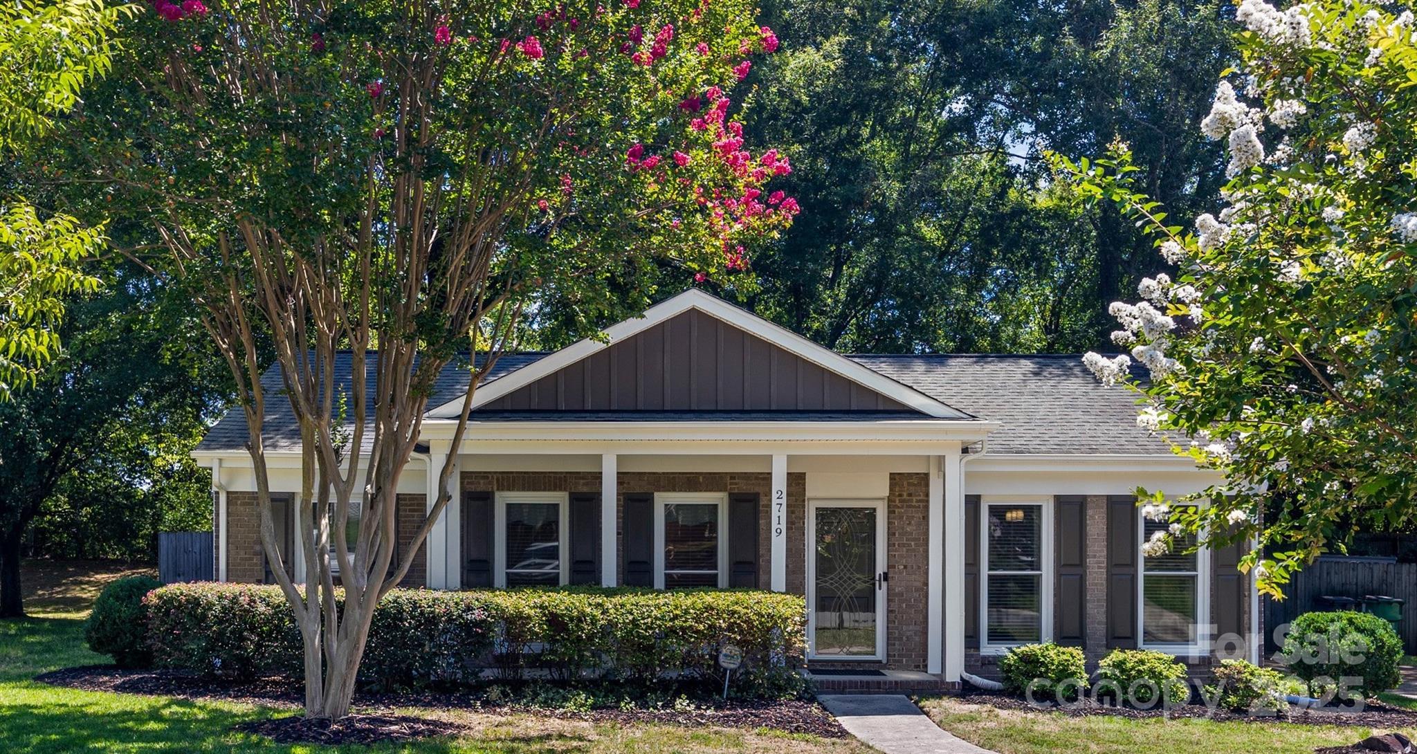 Stylishly updated, move-in ready home in PRIME South Charlotte walkable neighborhood! Fresh 2025 upgrades include bright, white kitchen with quartz counters, subway tile backsplash, stainless appliances, large pantry and super functional breakfast bar. Open plan with new LVP flooring in all living spaces. Vaulted ceiling family room with cozy brick fireplace and living room/office too. No popcorn ceilings here—smooth ceilings throughout and all new fresh neutral paint! Bathrooms upgraded with new vanities.  Peace-of-mind updates: James Hardie siding & vinyl double hung windows in 2016 ($23K!), gas water heater (2019), HVAC system (2009). Fully fenced, beautifully wooded back yard with deck to relax. No HOA and conveniently located to Quail Corners shopping, Southpark & Ballantyne. Refrigerator, washer & dryer remain so all you need to do is unpack and relax. Don’t miss this gem!