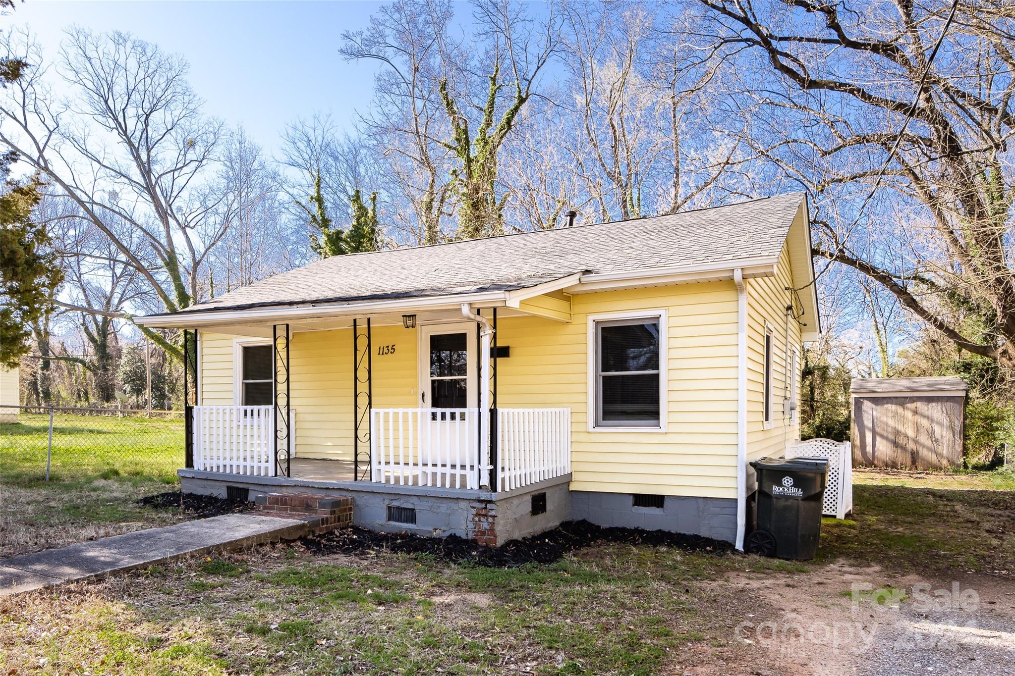 Welcome to your next home or investment opportunity in the heart of Rock Hill! This charming 2-bedroom, 1-bathroom home is perfectly situated near downtown and Winthrop University, ideal for homeowners or tenants. A cozy covered front porch welcomes you, while a generous lot allows for outdoor activities and potential expansion. Inside, hardwood floors and fresh paint create a bright, inviting atmosphere. Recent upgrades include a newer roof for peace of mind. Spacious bedrooms and a modern kitchen make this home move-in ready. Don't miss this chance to own a piece of Rock Hill's thriving community!