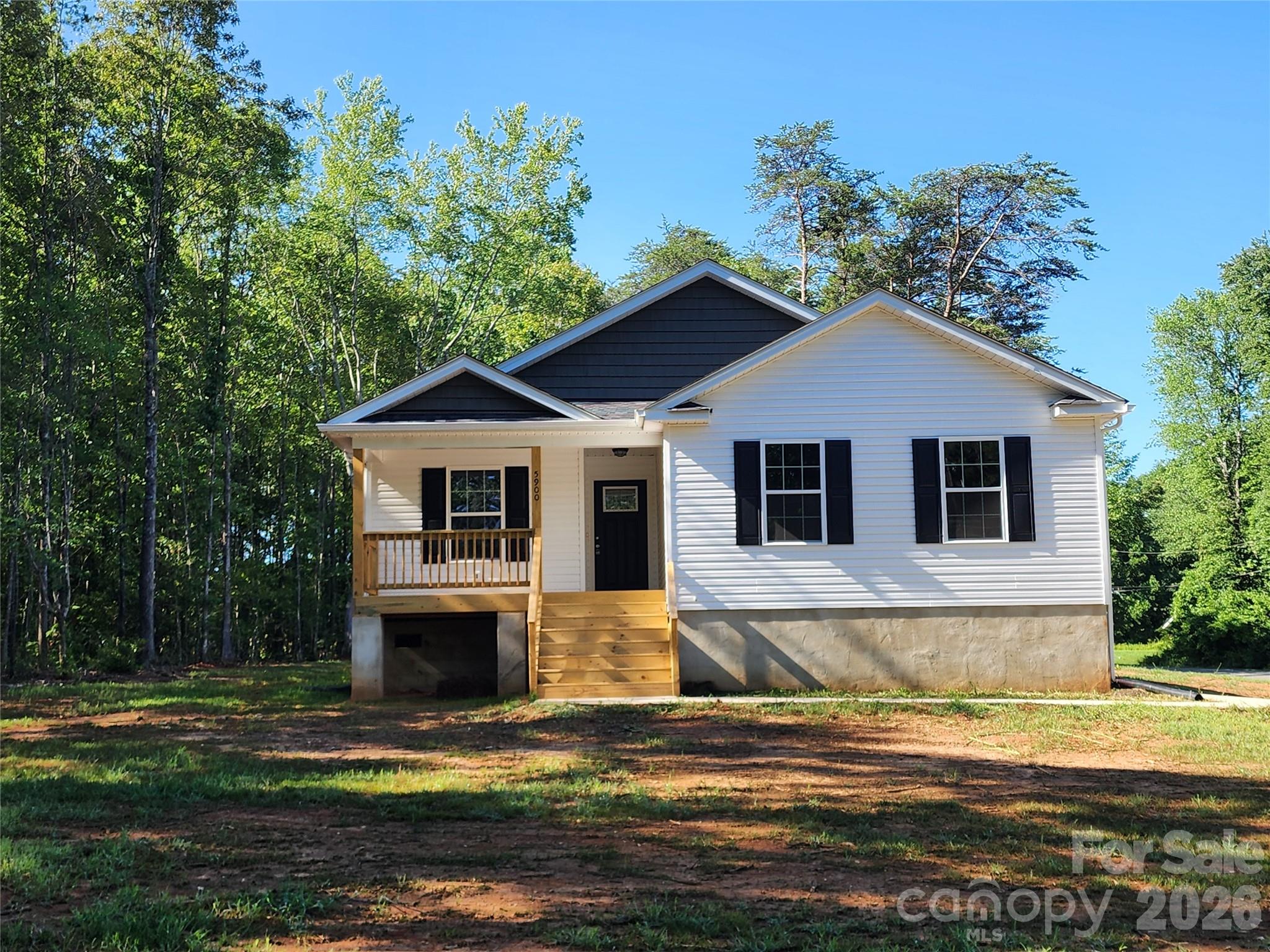 New Stylish RANCH Home, Covered Front Porch, Covered Rear Deck on Corner Lot in Conover, Open/Vaulted Living Area - Kitchen - Breakfast Area, Decorative Plant Shelves @ Open Areas, Master Suite Includes Tray Clg - Decorative Dual Vanity with Granite Top and Under Mount Sinks with a Large Walk In Closet, Kitchen Includes Stainless Steel Dishwasher -OTR Micro -Smooth Top Range with Large Walk In Pantry, Private Walk In Laundry Room, Hall Bath Includes Decorative Vanity with Granite Top and Under Mount Sink, Coat Closet Located in Foyer, NO Carpet - Laminate Wood Floors Through Out with Tile Floors in the Baths, Decorative Leaded Glass Front Door, Well Established Local Builder, Agent is Owner of the General Contracting Home Building Company, AGENT DOES NOT CHECK EMAIL REGULARLY, PLEASE CALL-TEXT w/ Questions/Interest