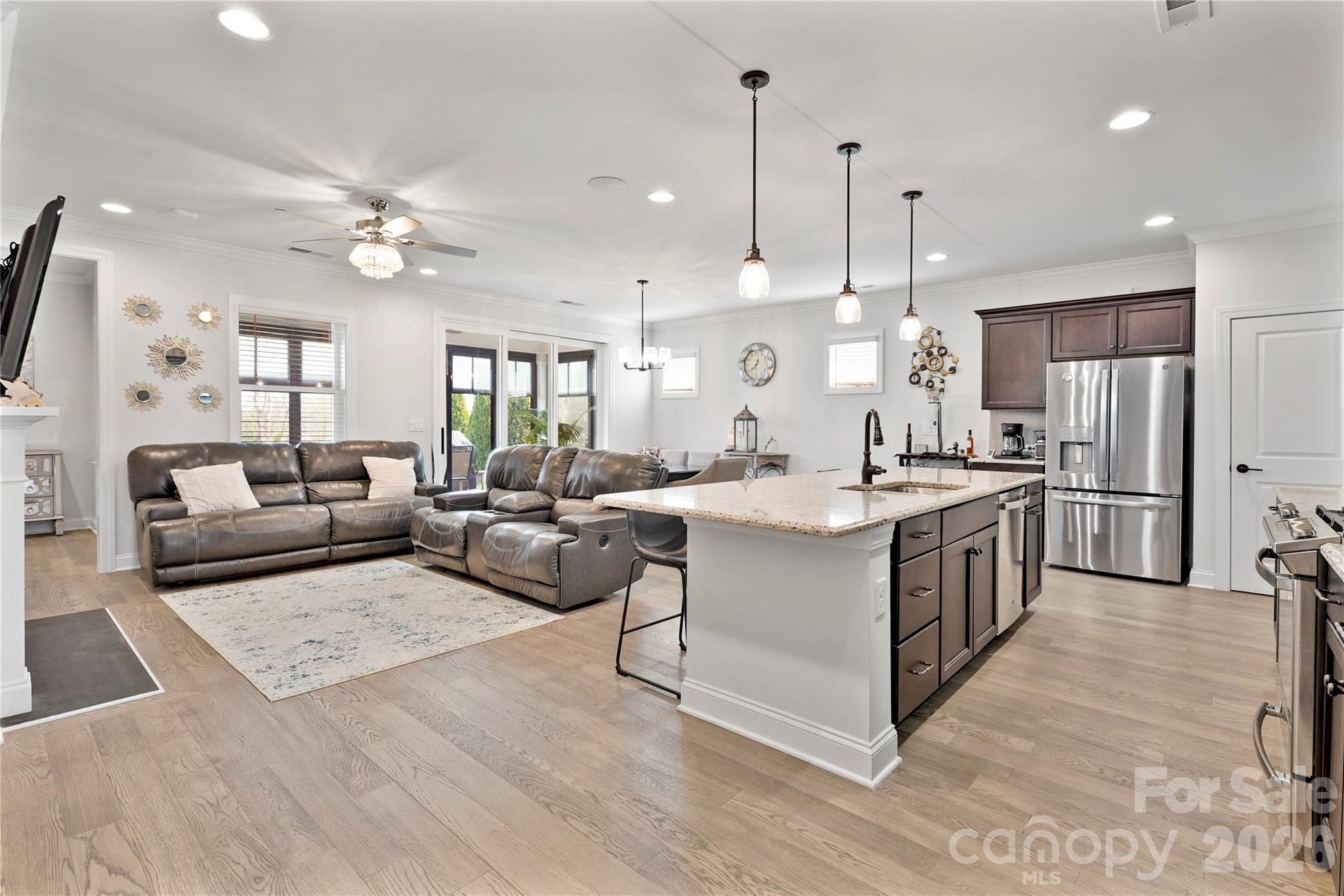 Most people think moving here means slowing down… in Trilogy Lake Norman, it is the exact opposite.

Welcome to 445 Bowline Dr, where low-maintenance living meets an active, resort-style lifestyle in one of the area’s most sought-after communities. This thoughtfully designed single-level home offers an open and functional layout with a spacious living and dining area, a well-appointed kitchen with a large island, and seamless flow for both everyday living and entertaining.

The primary suite provides a private retreat with a walk-in closet and en-suite bath, while an additional bedroom and dedicated office offer flexibility for guests, hobbies, or working from home. A screened porch extends the living space outdoors, creating the perfect setting to relax and unwind.

And here is where it gets even better… this home includes a membership to the Freedom Boat Club, giving you direct access to Lake Norman without the hassle of ownership. More time on the water, none of the maintenance.

Trilogy Lake Norman is known for its exceptional amenities and vibrant social atmosphere, offering fitness classes, pickleball, water volleyball, art and wine classes, community events, and a dedicated lifestyle director coordinating activities, trips, and gatherings. Whether it is a quiet evening by the fire pit with live music or an active day with neighbors, this is a community designed for connection and convenience.

If you have been thinking about simplifying your home without sacrificing lifestyle… this is what that actually looks like.