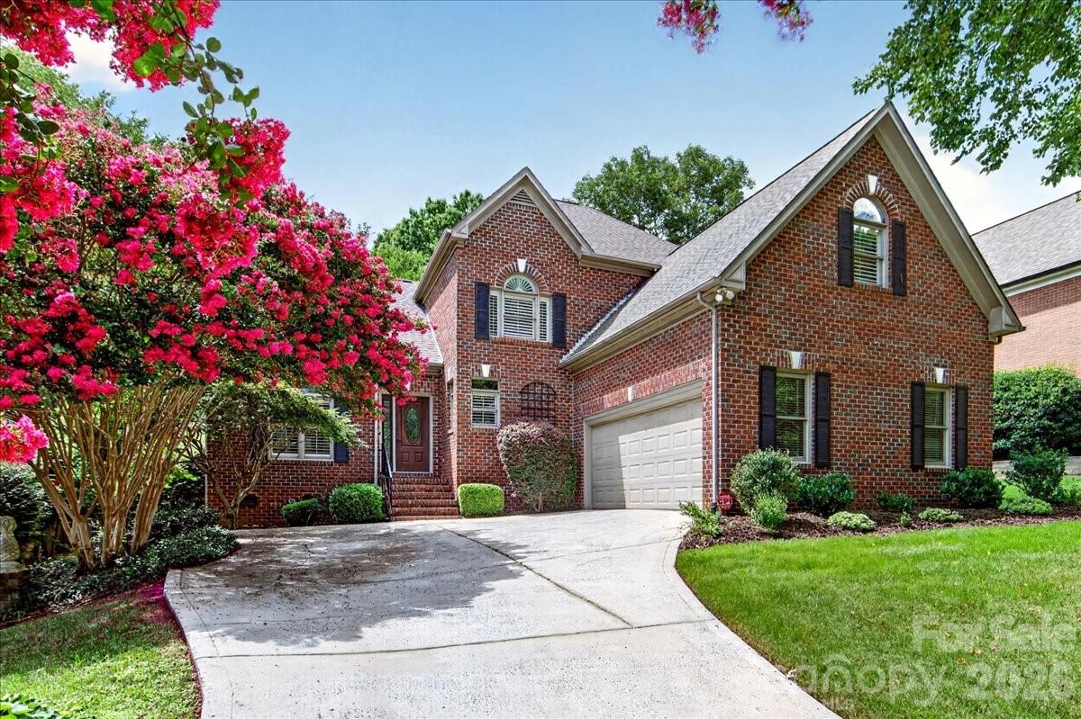 Wonderful all-brick home in prime South Charlotte location, tucked away in a private enclave of newer homes within established Olde Providence. Easy access to the city center and its amenities. Bright, spacious, open floor plan with beautiful hardwoods throughout the main level and 10-ft ceilings. Open-concept kitchen with granite countertops and stainless-steel appliances, flowing into the elegant dining room with tray ceiling, living room, and breakfast area. Spacious primary suite on the main level has upgraded bath and walk-in closet. Separate laundry/utility room off kitchen with shelving and storage. Upper level features a second primary bedroom/guest suite and two additional bedrooms, one currently used as an office with a custom built-in desk and street view. Generous storage includes a two-car, side entry garage with built-in cabinets and shelving, walk-in attic. High-ceiling screened porch overlooks the large fenced backyard with water feature, brick patio, irrigation system, mature trees, and professionally designed landscaping. Lot size allows privacy with a peaceful neighborhood feel. Minutes from SouthPark, Ballantyne, Uptown, and I-485, offering both quiet community and convenience. Washer/dryer convey. No HOA. Convenient to neighborhood Windyrush Swim & Tennis Club.