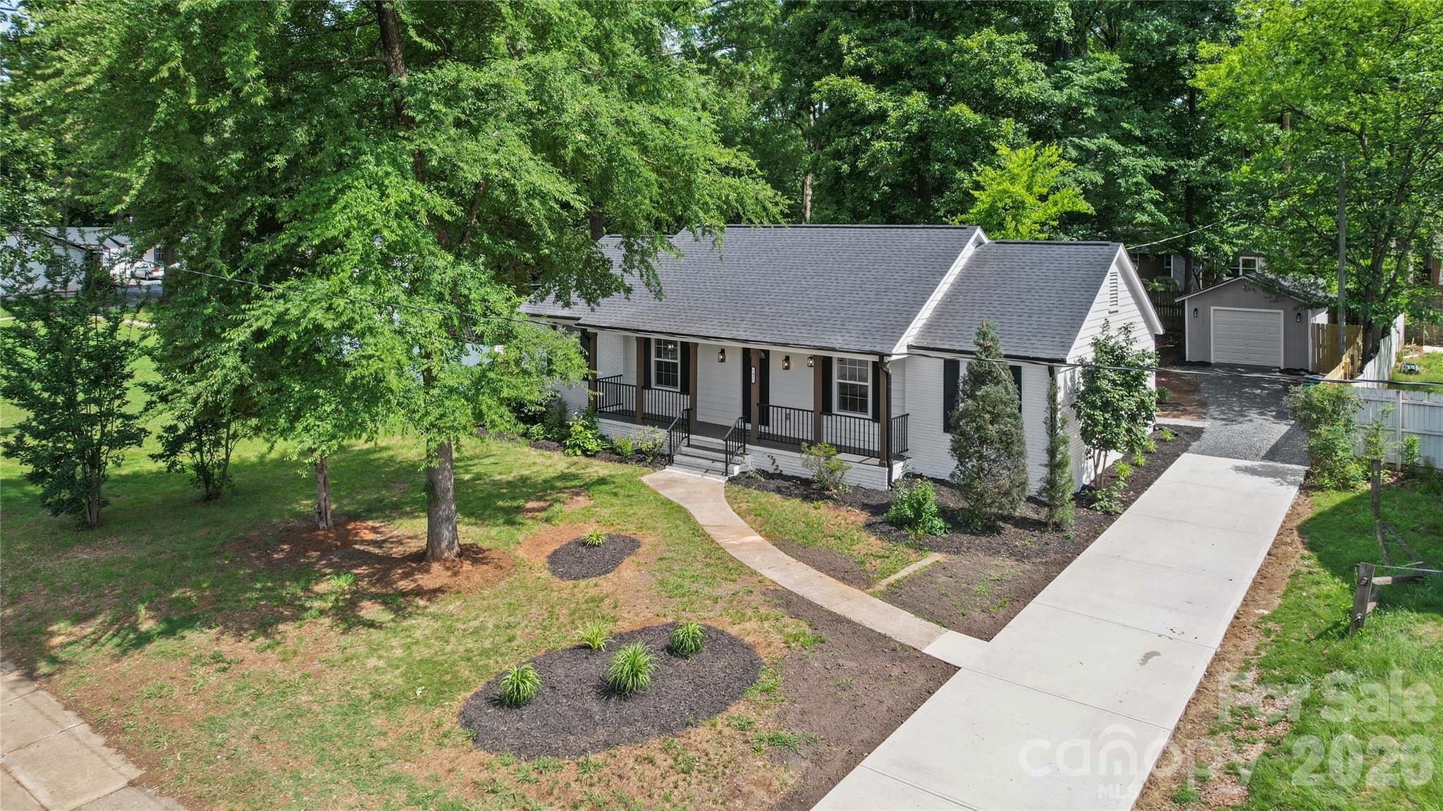 Welcome to 1421 Tyvola Rd – a beautifully renovated, move-in-ready home offering modern comfort, thoughtful upgrades, and an exceptional location near Charlotte’s highly desirable SouthPark area.

This charming 3-bedroom, 2-bathroom home features an open-concept floor plan with vaulted ceilings, abundant natural light, and luxury vinyl plank flooring throughout. The stunning renovated kitchen showcases elegant waterfall-edge quartz countertops, custom cabinetry, stainless steel appliances, a subway tile backsplash, and stylish lighting fixtures, creating the perfect space for both everyday living and entertaining.

Both bathrooms have been tastefully renovated with modern tile finishes, designer vanities, custom mirrors, and contemporary fixtures. Additional improvements include fresh interior paint, new windows, updated lighting and ceiling fans, new cabinetry throughout the home, and a new water heater.

The exterior has also been extensively improved with new roofing on both the home and detached garage, freshly painted exterior surfaces, and a newly resurfaced driveway that enhances both curb appeal and functionality.

Location is everything, and this home truly delivers. Situated directly across from Pinewood Elementary School and within walking distance to parks, daycare facilities, recreational amenities, restaurants, and shopping, it offers exceptional everyday convenience. Residents also enjoy quick access to SouthPark Mall, Marion Diehl Park, Uptown Charlotte, major highways, medical facilities, and Charlotte Douglas International Airport.

Whether you’re looking for a primary residence, a second home, or an investment opportunity, 1421 Tyvola Rd offers the perfect combination of modern updates, walkability, convenience, and location.

Don’t miss the opportunity to make this beautifully updated home your own. Schedule your private showing today!