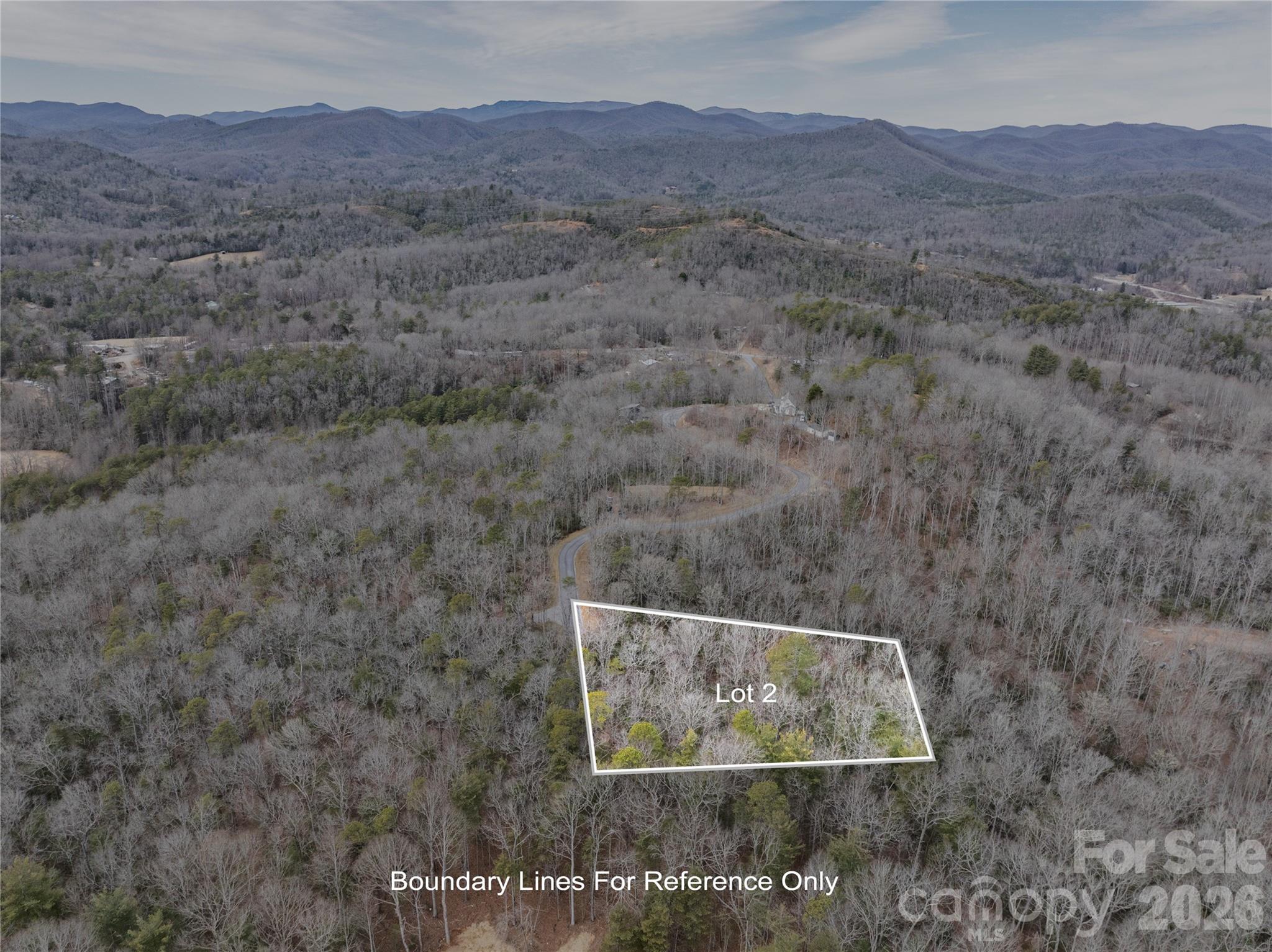 Welcome to a rare micro-neighborhood opportunity in the heart of Western North Carolina. Conveniently located between Hendersonville, Mills River, and Brevard this thoughtfully planned community features five oversized homesites perched along a gentle ridge, offering the perfect blend of privacy, natural beauty, and everyday convenience. Each lot enjoys excellent year-round sunlight. Mature hardwoods and native flora create a stunning canvas on which to bring your personal dream to life on. Generous lot sizes provide ample space to design your custom home with ample outdoor living areas, all with a peaceful sense of seclusion.
Easy-to-navigate roads make access simple and practical, ideal for year-round living or a mountain retreat. The topography is gently sloping offering flexible building sites without the steep grades often found in the mountains Located just minutes from the world-renowned trails, waterfalls, and outdoor adventures of Pisgah National Forest, this property places hiking, biking, fishing, and scenic drives right at your doorstep. Enjoy the serenity of a private mountain setting without sacrificing proximity to recreation and amenities. Build community with friends and neighbors at a shared shelter and firepit, and hike or bike from your backdoor on the ~1 mile neighborhood trail.