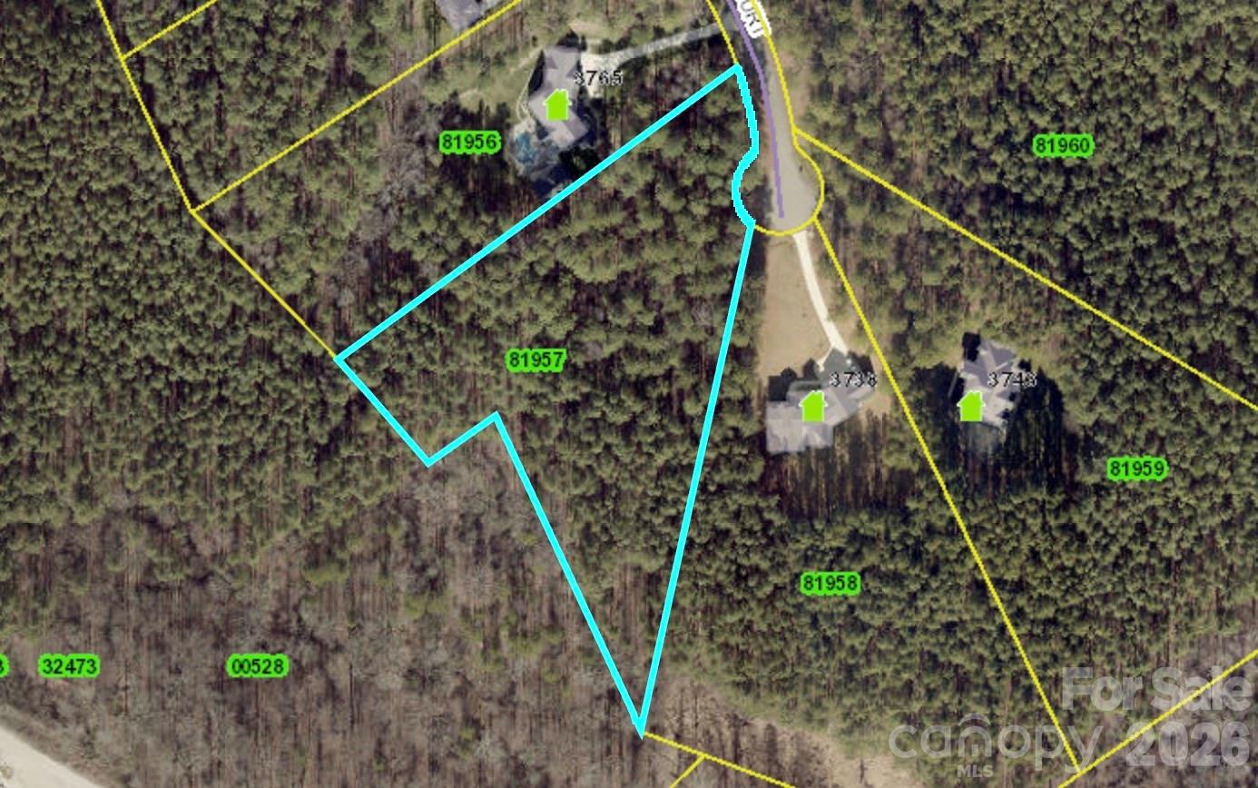Beautiful 3.48-acre cul-de-sac homesite in an exclusive gated Lake Norman community! Tucked away at the back of the neighborhood, this private, wooded lot offers the perfect setting to build the custom home you've always envisioned. Surrounded by impressive estate-sized homesites, you'll enjoy a peaceful, secluded atmosphere with plenty of room to create your own private retreat. Whether you're dreaming of a sprawling estate, outdoor living spaces, or simply enjoying the beauty of nature, this exceptional property provides endless possibilities. Conveniently located in desirable Lincoln County with Lincoln County taxes and schools, this is a rare opportunity to build in one of Lake Norman's most sought-after gated communities.