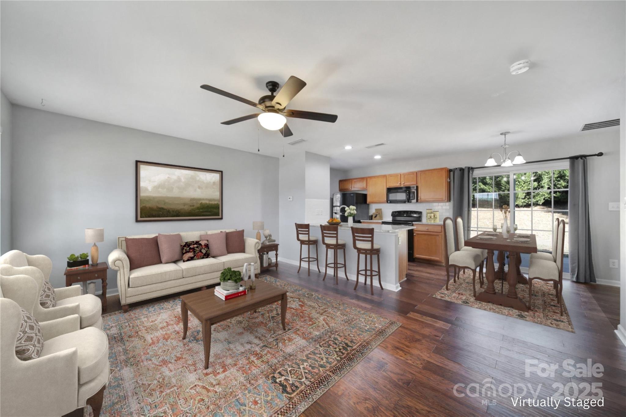 If you're looking for affordable housing, this is it! This charming 3-bedroom, 2-bathroom home is the perfect package in the award winning Clover school district. The main level features laminate wood flooring, a cozy living room, dining area and an open kitchen with plenty of cabinet space, a full pantry, and sliding doors that open to the back patio. Upstairs, the primary bedroom stands out with vaulted ceilings, an en-suite with a garden tub, and a wide vanity. Two additional bedrooms and a full hall bath round out the second floor. Step outside to a fenced-in backyard perfect for pets, play, or weekend cook-outs. You’ll also enjoy a one-car garage, a shed for your yard tools and toys, a corner lot and the peace of mind that comes with a move-in-ready home. Take advantage of this great location close to schools, shopping, and downtown Clover. This property is eligible for 100% USDA financing, so let's see if you qualify!