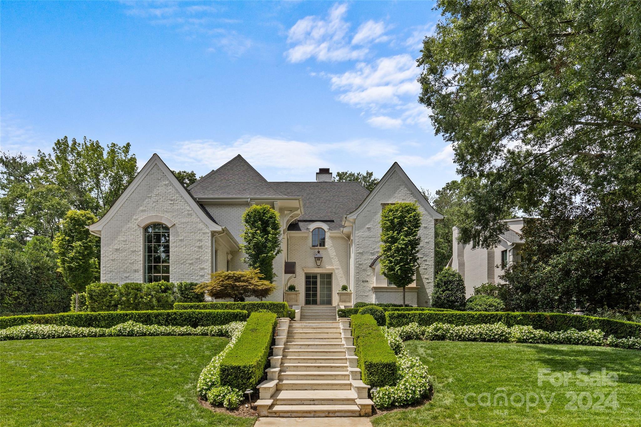 LUXURY LIVING IN FOXCROFT! This spectacular home exudes luxury & sophistication w/unique, custom & high-end finishes through-out. Desirable floorplan for effortless entertaining & everyday living. Show-stopping chef’s kitchen w/island & pantry open to spacious fireside living rm w/coffered ceilings & breakfast rm. Gorgeous dining rm & study w/cathedral ceiling. Primary suite on main w/ensuite bath w/double vanity, shwr, soaking tub, walk-in closet & laundry. 3 addt'l bedrooms w/ensuite baths, rec rm & 2nd laundry, upstairs. Bonus, 5th bedroom & full bath above garage, accessed off the drop zone. Extend entertaining outdoors on the covered terrace w/fireplace, built-in htrs & retractable screens & patio w/built-in grill, overlooking the private flat fenced bkyrd. Drop zone w/built-ins & office. 2-car garage & 3rd bay for storage area/wkshp. Extra driveway parking. 3rd-flr attic & hidden closets. Full house generator, tankless wtr htrs & encapsulated. Near Foxcroft Hills Swim & Racquet.