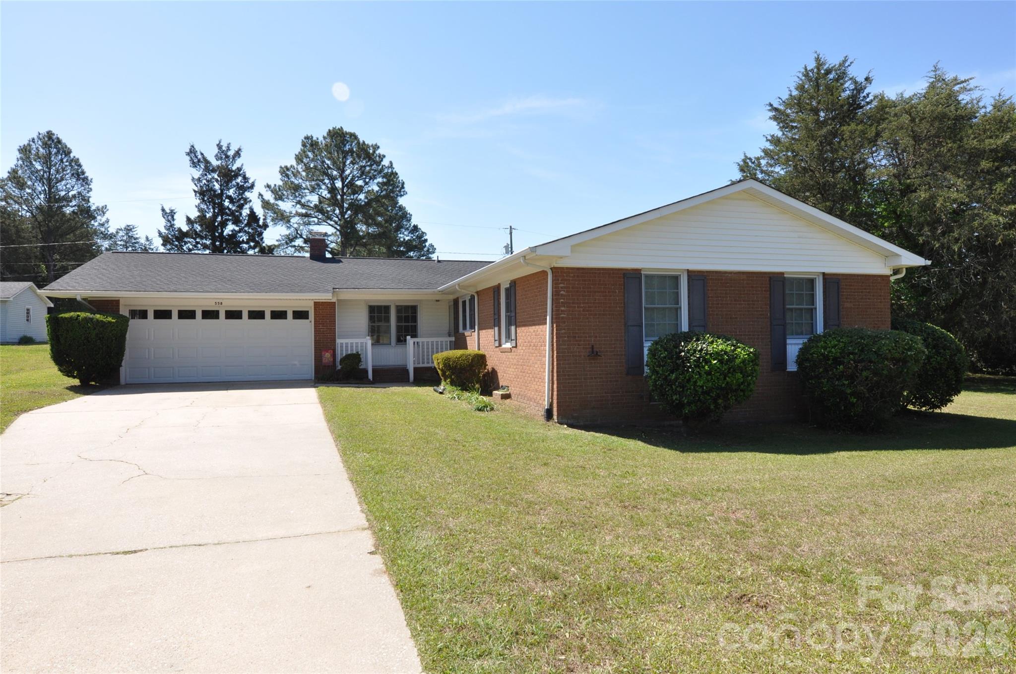 Three-bedroom, two-bath all-brick ranch situated on a spacious double lot totaling approximately 0.78 acres. This well-maintained home features a two-car attached garage with an automatic door opener and a cozy fireplace in the den. The galley-style kitchen is appointed with classic wood cabinetry and offers efficient functionality.

A generous formal living room provides flexible space for both living and dining arrangements. The home includes large bedrooms throughout, ensuring comfort and versatility. A standout feature is the heated and cooled sunroom, filled with abundant windows that invite natural light year-round.

With ample indoor living space and expansive outdoor potential, this property offers both comfort and opportunity. Ideally located just minutes from downtown Chester, you’ll enjoy the benefit of county taxes while being part of a growing community. Convenient access to Charlotte and Columbia makes commuting or travel easy.