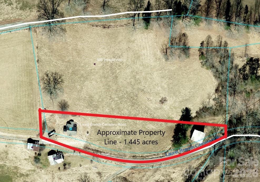 Positioned on 1.445 acres carved from a larger tract, this property offers a rare combination of accessibility, flexibility, and long-range potential. With most of the acreage along the road, it’s an ideal setup for investors, builders, or anyone looking to create a custom mountain retreat without the challenges of steep or landlocked terrain.

The existing 1963 home (2BR/1BA) has been partially taken down to studs — creating a blank slate for a full renovation or a clean teardown for new construction. The footprint, along with existing infrastructure, could provide a valuable head start depending on your plans.

A standout feature is the large wooden barn, offering storage, workshop space, or potential creative reuse. The land itself is gently sloped and usable, with mountain views and multiple potential build sites. Enjoy the charm of a front porch setting with views, plus a screened back porch area that hints at the property’s original character.

Located just 10 minutes to both Mars Hill and Marshall, and only 20 minutes to Weaverville, you get the balance of quiet mountain living with easy access to growing small-town hubs.

This is a project—but it’s the kind with upside. Whether you’re looking to build new, invest, or create a mountain getaway, the fundamentals here are solid.

**FHA Renovation loans are available - contact agent for details!